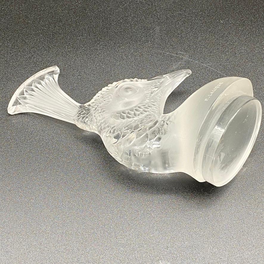 R.lalique was famous for his car mascots production which started in the 1920tys with the car industry boum.

All subjects were studied and realized.

The Peacock mascot is amongst the famous one.

