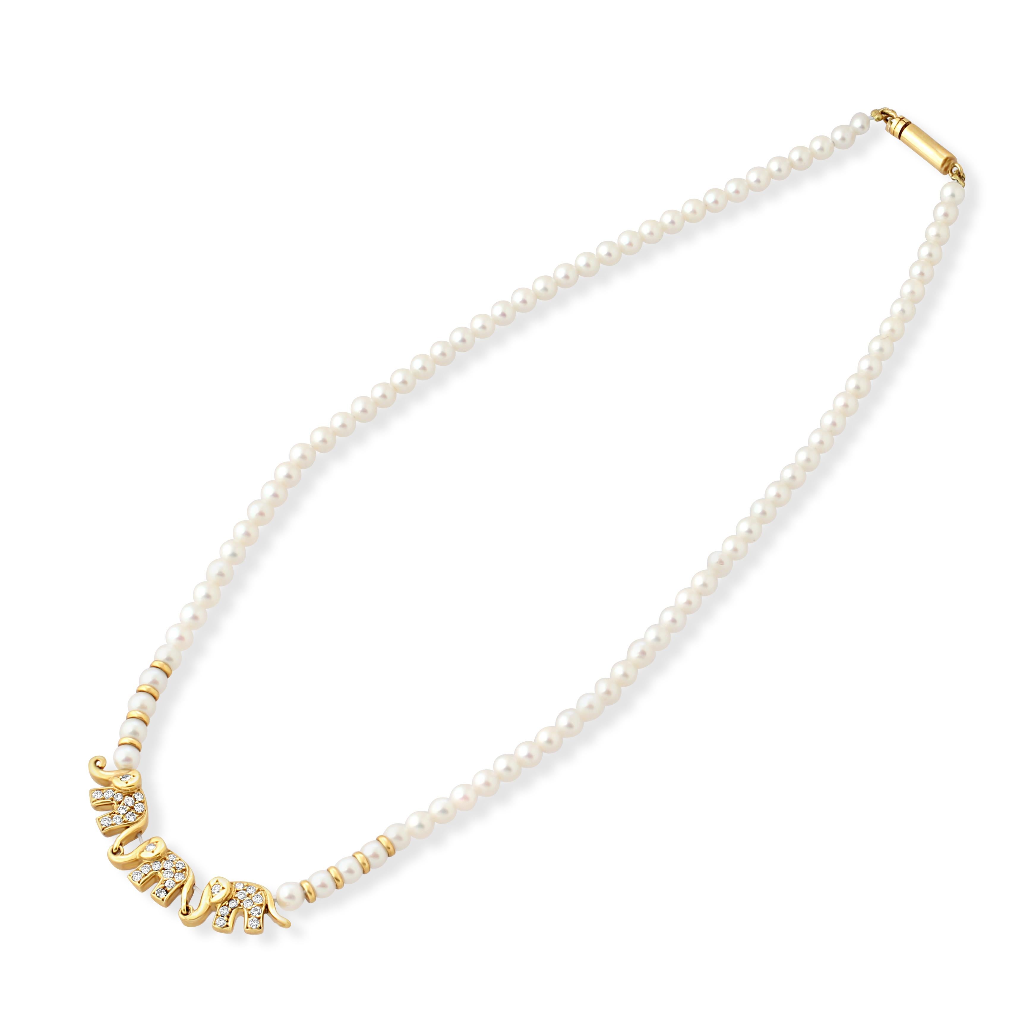 A stylish vintage necklace by Fred, Paris. Made up of a single strand of pearls with 3 elephants at the centre crafted from 18k gold and set with diamonds. The necklace also features gold accent beads in the centre and a gold clasp. Signed Fred,