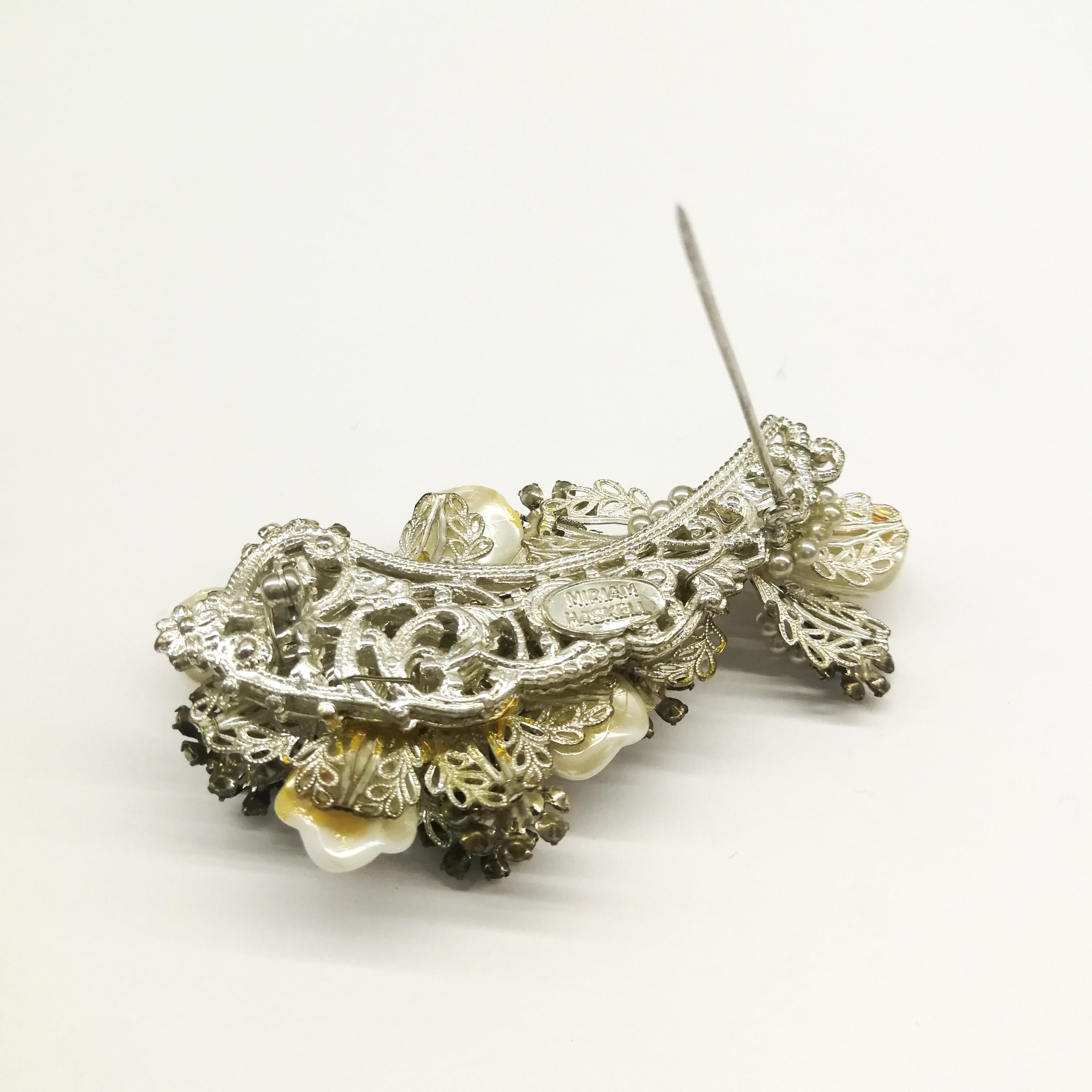 A pearlised glass 'leaf' and paste 'spray' brooch, Miriam Haskell, USA, 1960s 2