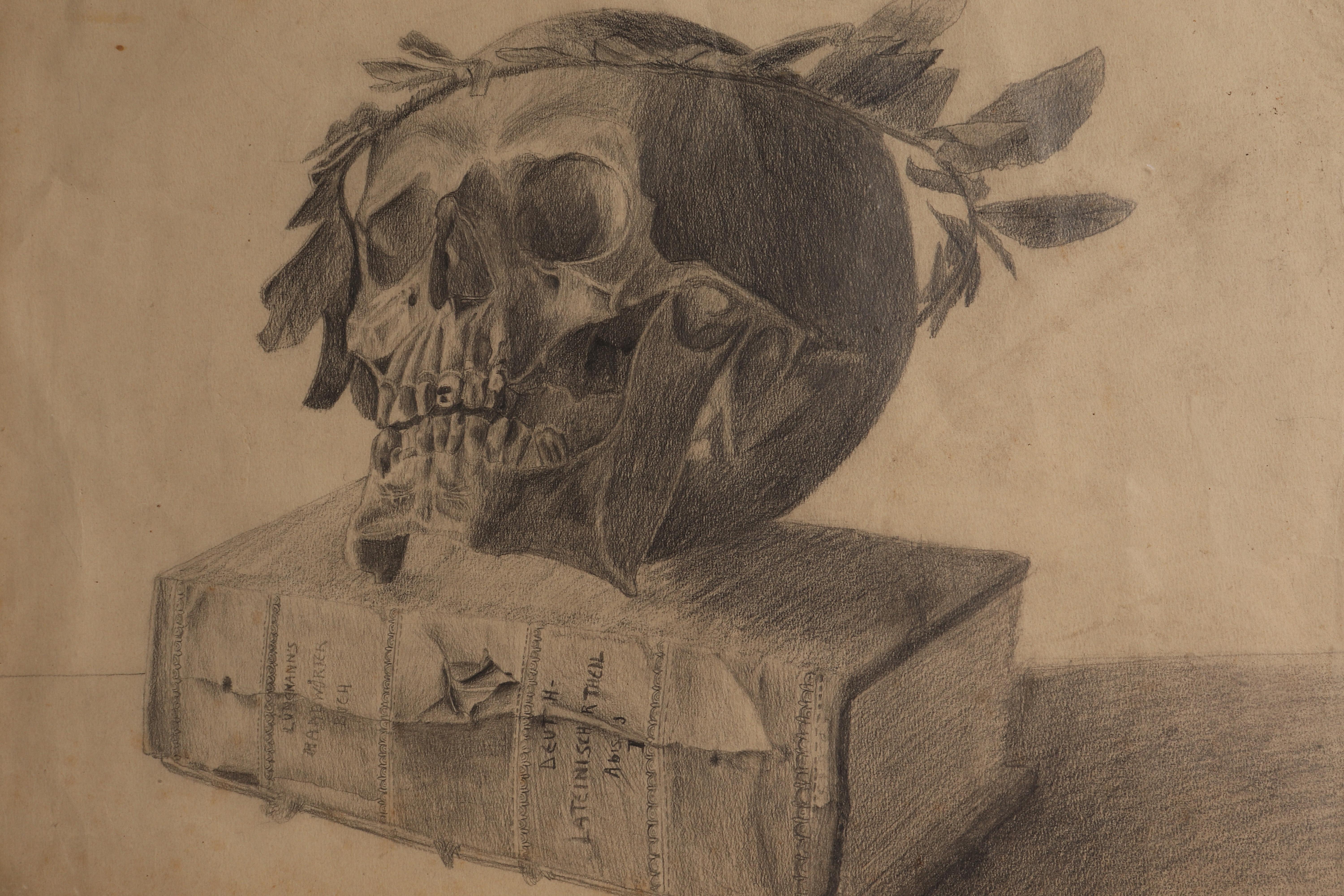 A pencil drawing on paper depicting a book with a skull on it. Solid wood frame, guilded with original glass. Signed Hans Sternbach. Vienna, Austria circa 1920.