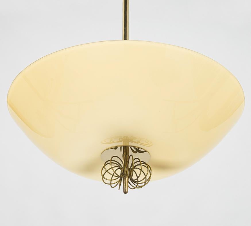 A pendant by Paavo Tynell, model 1088. In Good Condition For Sale In Long Island City, NY