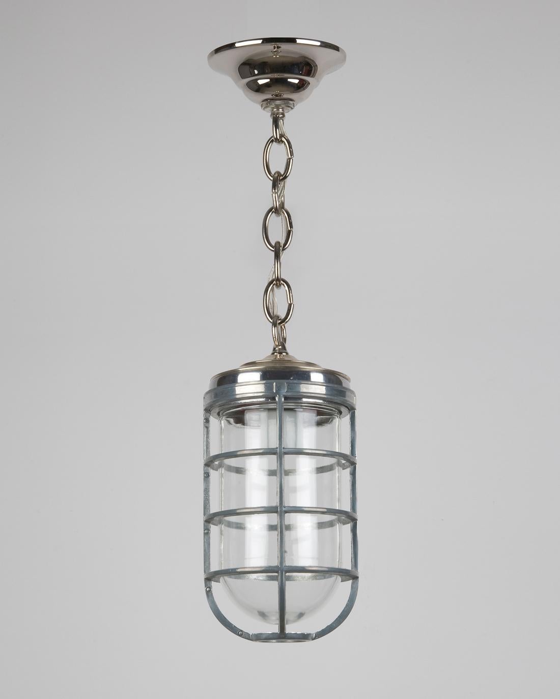 Aluminum Industrial Cage Pendant with Clear Glass Lens and Nickel Fittings In Good Condition For Sale In New York, NY