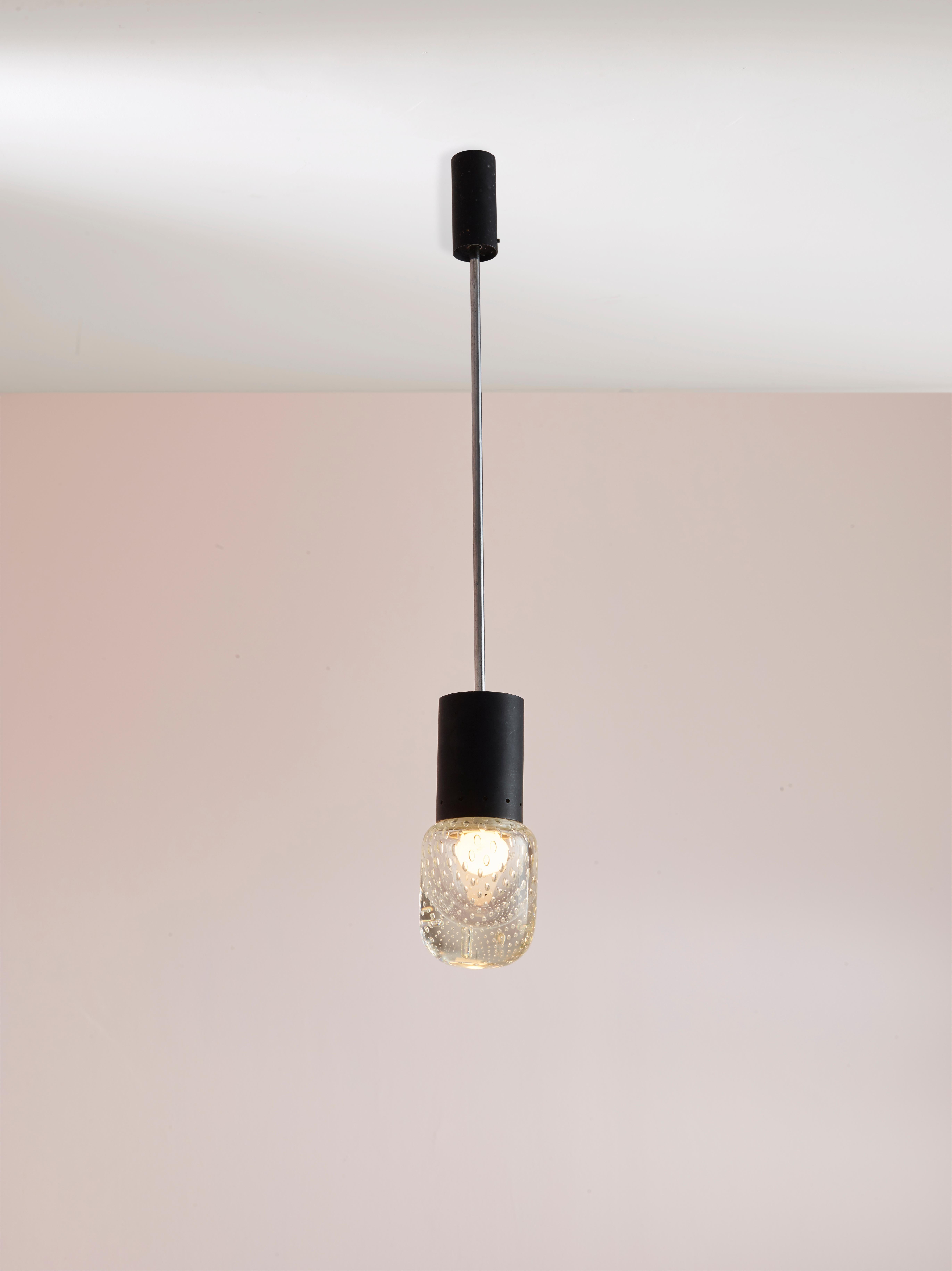 The pendant light is a beautiful example of mid-century modern design, produced in the 1960s by the renowned Italian glassmaking company Seguso Vetri D'arte and designed by the celebrated lighting designer Gino Sarfatti. 

This light is made of