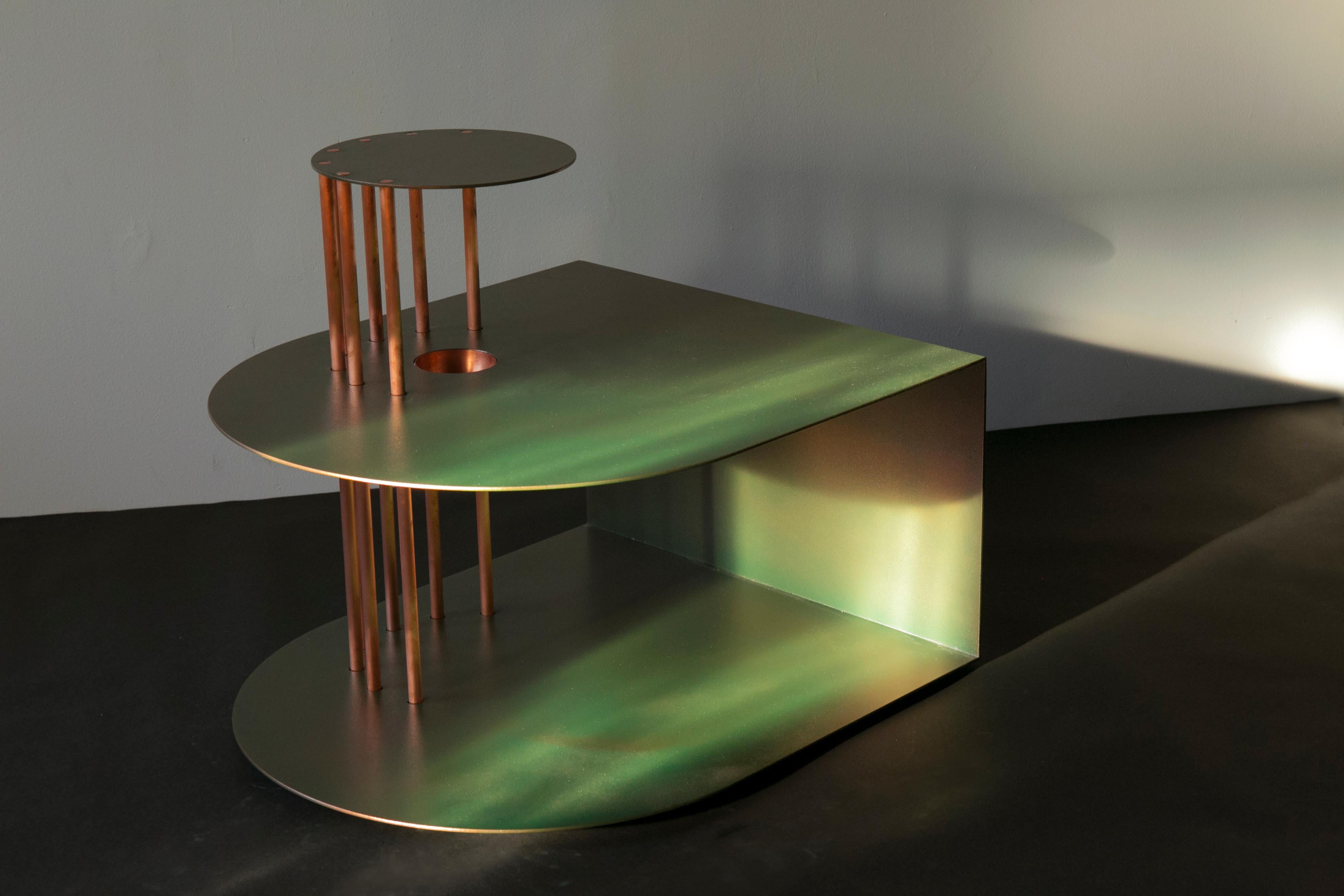 A Penny For Your Thoughts Side Table pairs raw copper with welded steel for an elegant and honest piece of design.  The powder-coated steel body is pierced by 5/8