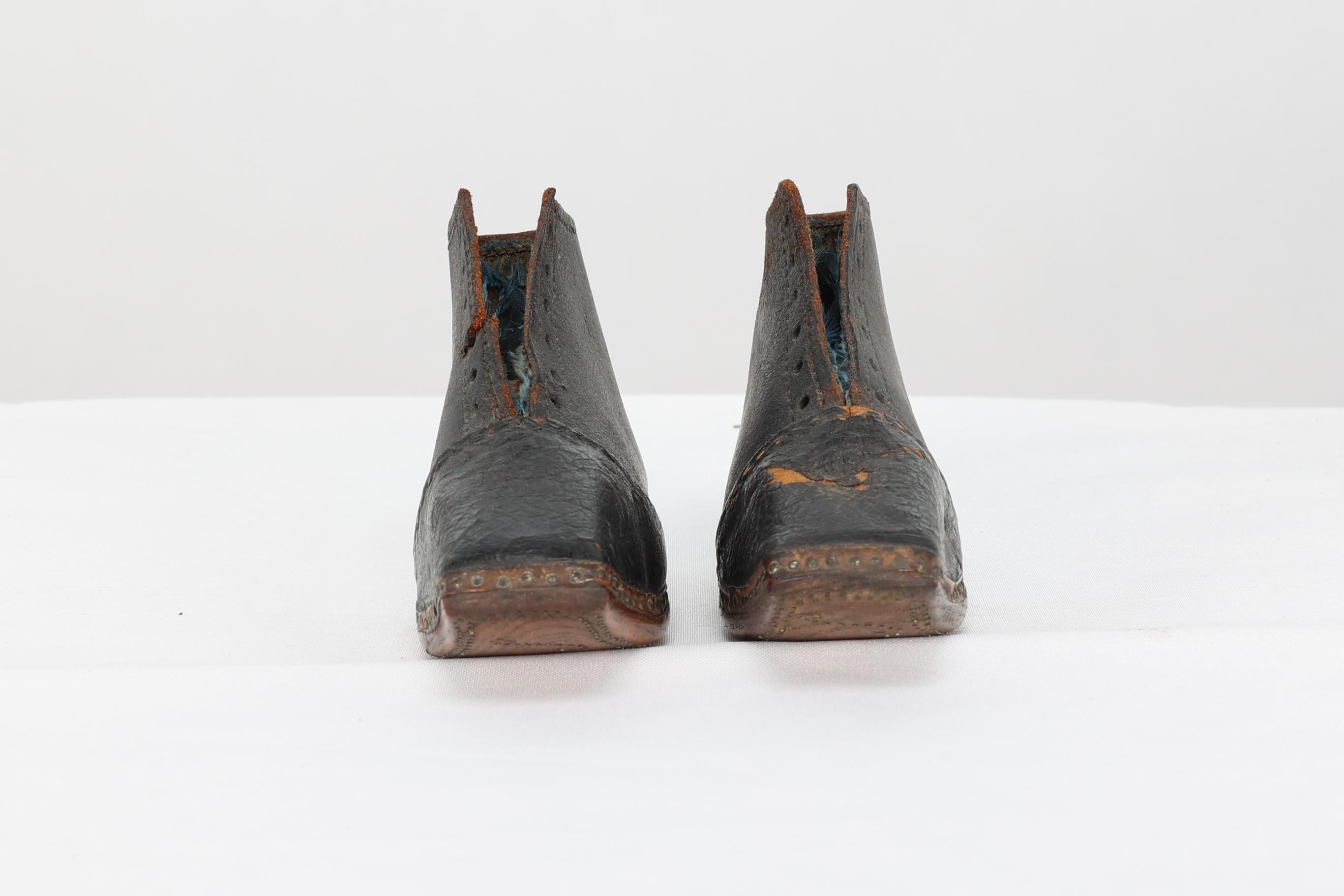 A perfect almost unworn pair of period 19th century hand made leather baby shoes.
