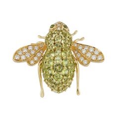 A Peridot And Diamond Bee Brooch