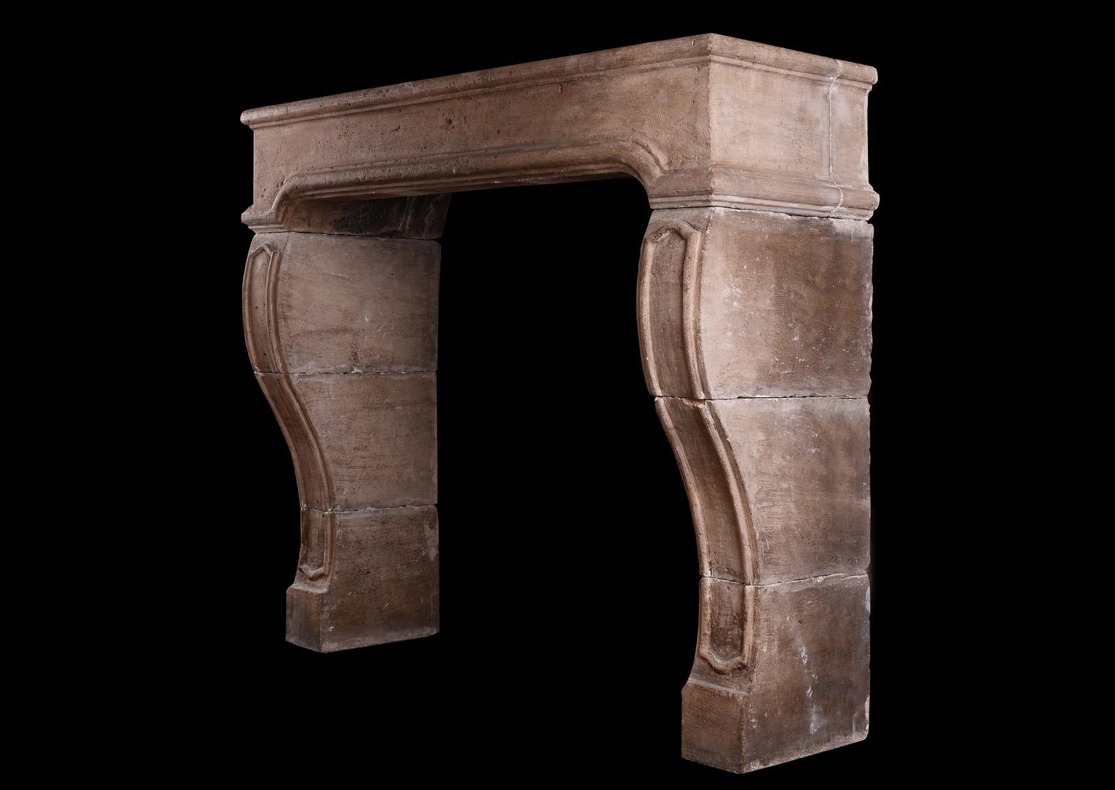 18th Century and Earlier A Period French Louis XIV Limestone Fireplace For Sale