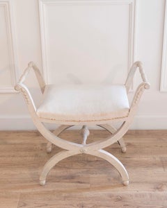 A period Gustavian stool with handles, scraped to original paint