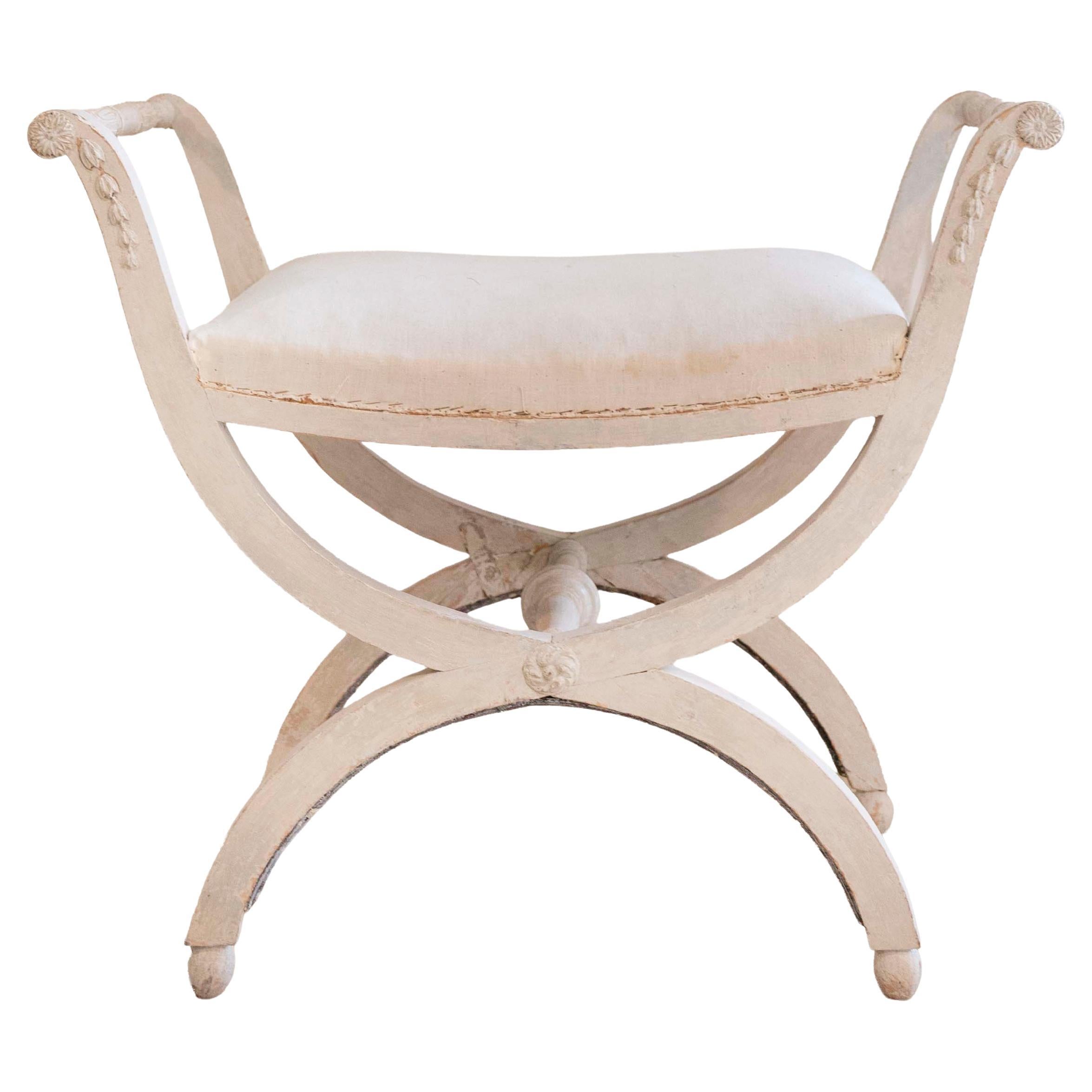 A period Gustavian stool with handles, scraped to original paint
