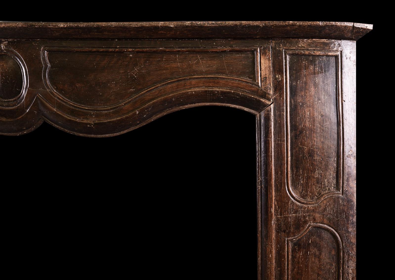 French Period Transitional Louis XIV/XV Fireplace in Walnut For Sale