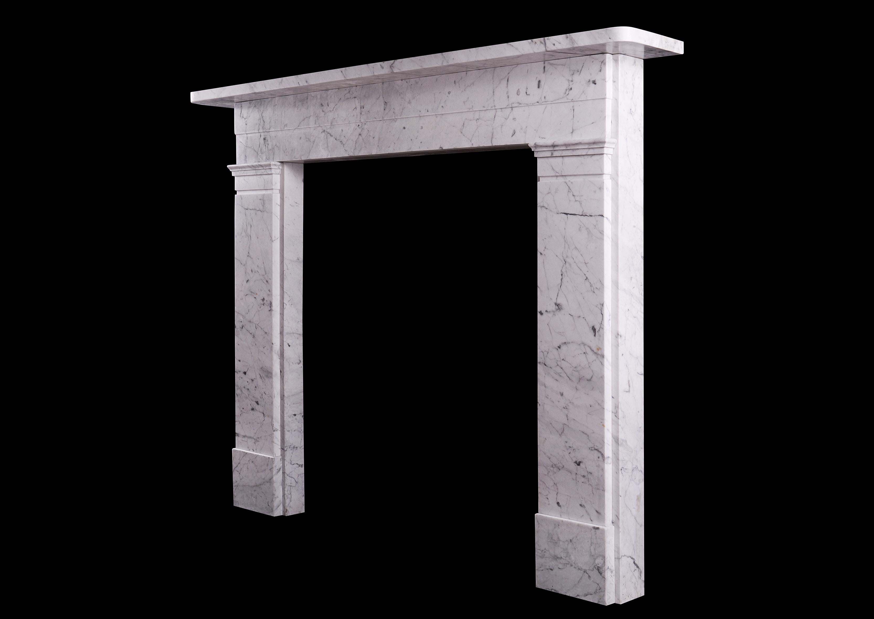 A period Victorian marble chimneypiece in Italian Carrara marble. The flat jambs surmounted by stepped frieze with plain shelf above. English, mid 19th century.

Measures: Shelf width: 1503 mm 59 