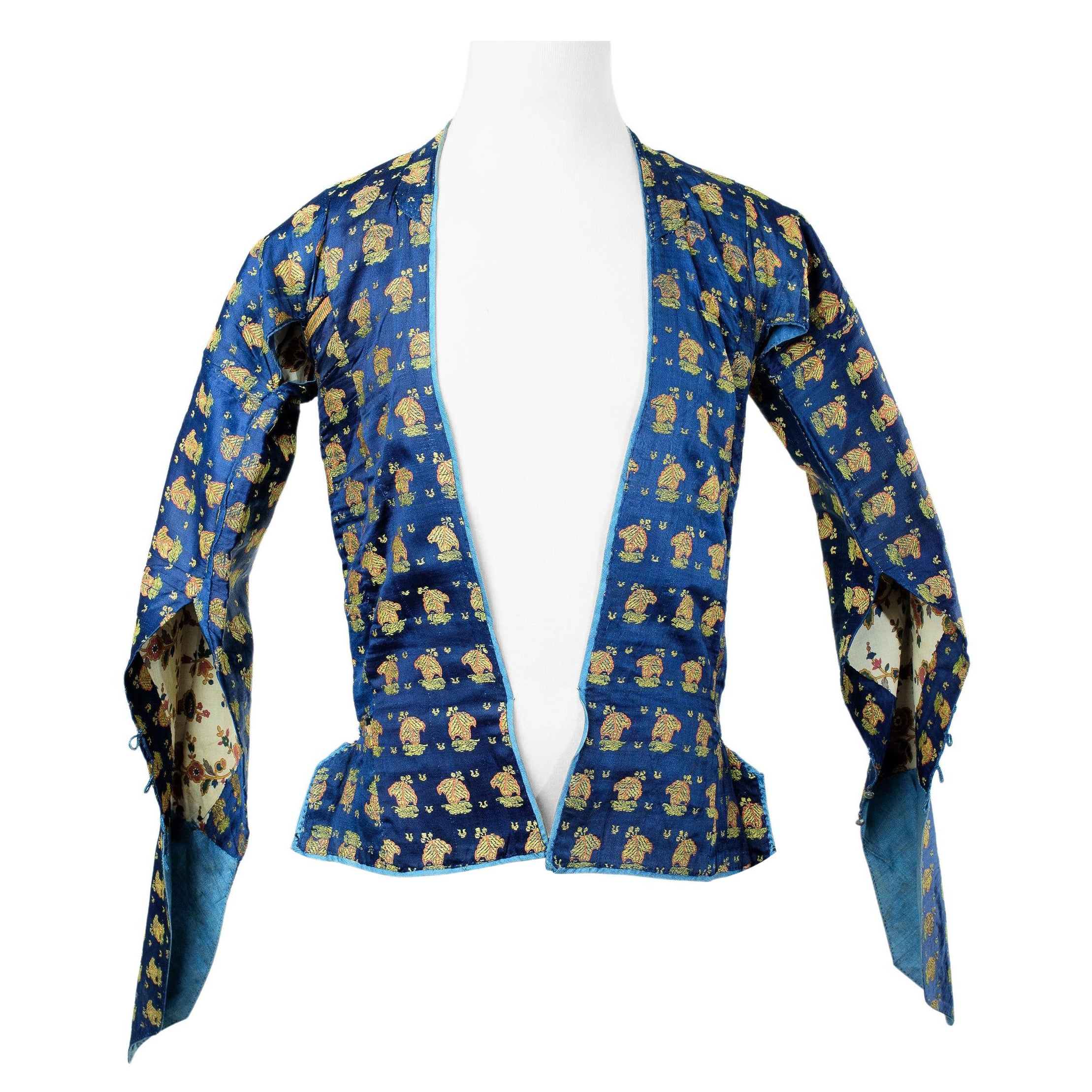 A Persian Jacket in Brocaded Lampas and Printed cotton lining  Kadjar 19th c