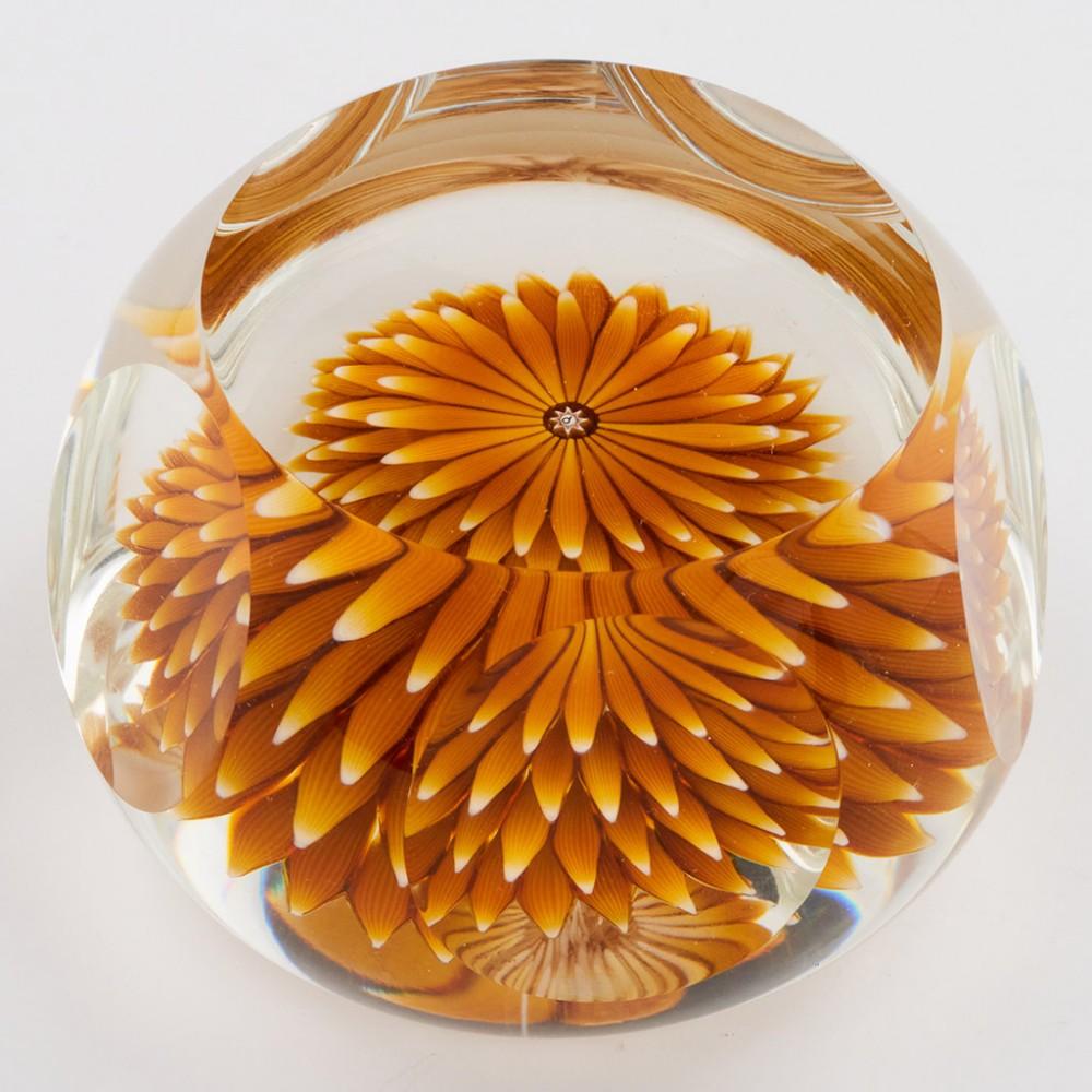 A Perthshire Golden Dahlia Paperweight, 1986

Additional information:
Date : 1986
Origin : Scotland
Features : Four layers of amber petals forming a large upright Dahlia blossom. Top facet and five side facets
Marks : A central P cane at centre of