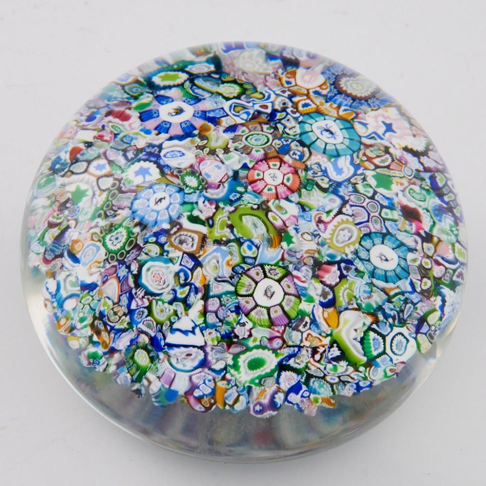 A Perthshire Magnum Close Packed Silhouette MIllefiori Paperweight, 1987

Original Box.

Additional information:
Date : 1987
Origin : Scotland
Features : A magnum close packed millefiori design containing many complex and picture canes on a