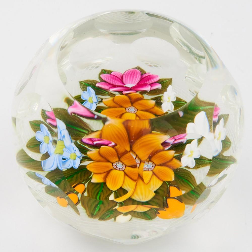 A Perthshire Three-Dimensional Bouquet on Lattice Basket Paperweight, 1997

Original box.

Additional information:
Date : 1997
Origin : Scotland
Features : Four flowers and three buds on a bed of leaves over a latticino cushion ground. Top facet and