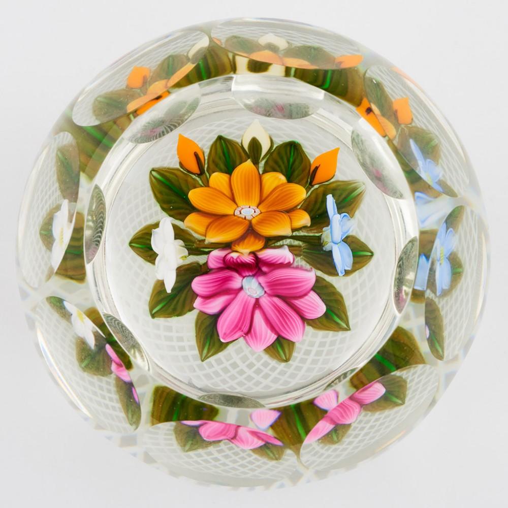 A Perthshire Three-Dimensional Bouquet on Lattice Basket Paperweight, 1997

Additional information:
Date : 1997
Origin : Scotland
Features : Four flowers and three buds on a bed of leaves over a latticino cushion ground
Marks : Scratch signed P on