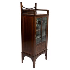 Antique A Petite Arts & Crafts Mahogany Display Cabinet in the Anglo-Japanese Style.