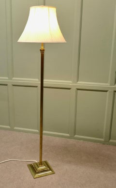 A Petite Corinthian Column Brass Floor Lamp A lovely design