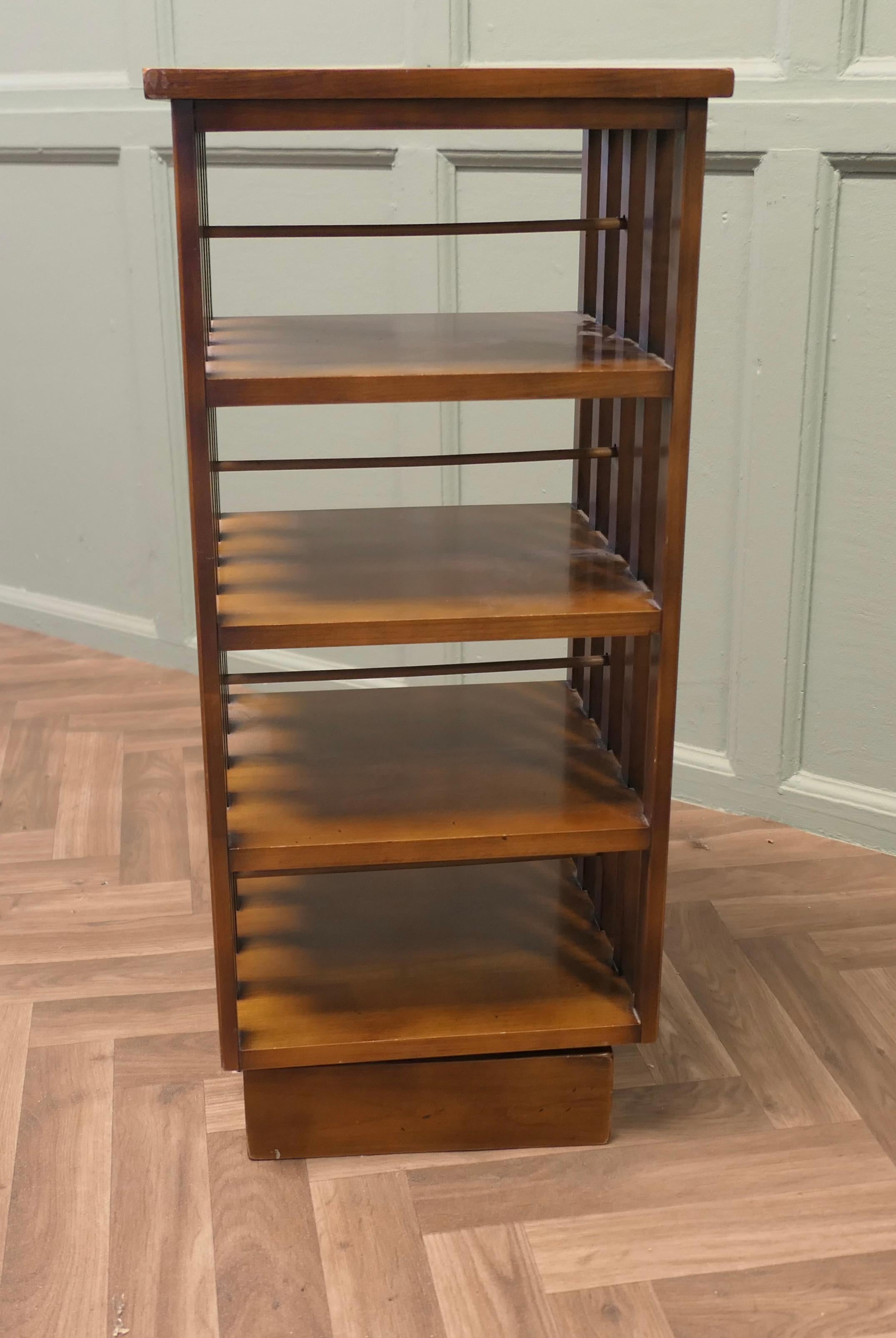  A Petite French 4 Shelf Revolving Bookcase 

The Bookcase is French and is of excellent Quality it has full width access from the open sides and the slatted sides keep the books in place, the stand revolves freely
The bookcase is in excellent and 