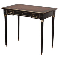 Petit bureau français en acajou ébénisé de style Louis XVI, vers 1940.