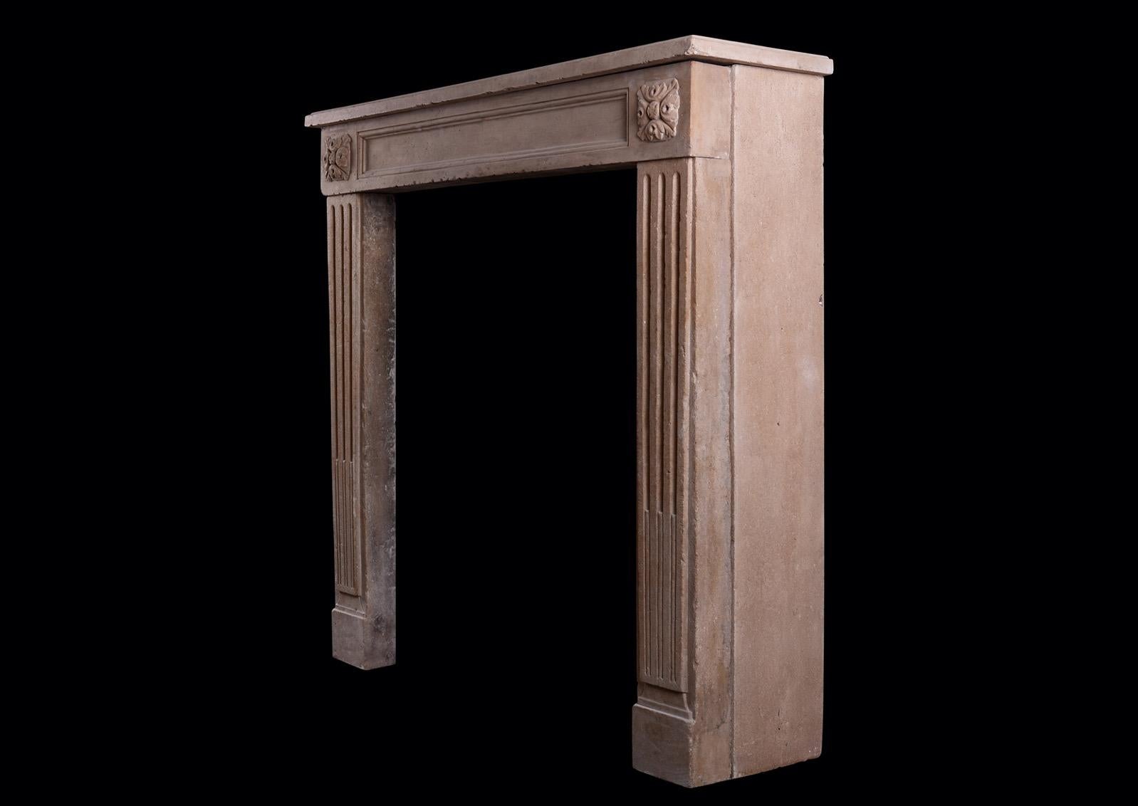 Petite French Limestone Fireplace in the Louis XVI Manner In Good Condition For Sale In London, GB
