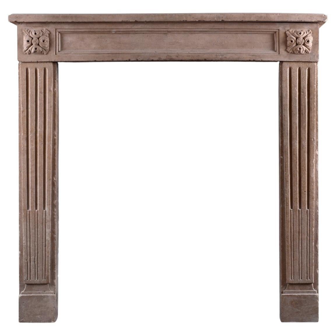 Petite French Limestone Fireplace in the Louis XVI Manner For Sale