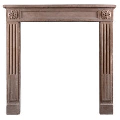 Antique Petite French Limestone Fireplace in the Louis XVI Manner