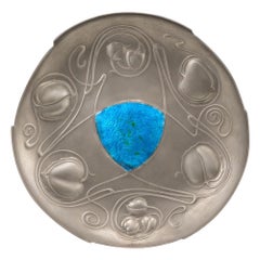 A Pewter and Enamel Bollelin Dish Designed by Archibald Knox, c1905