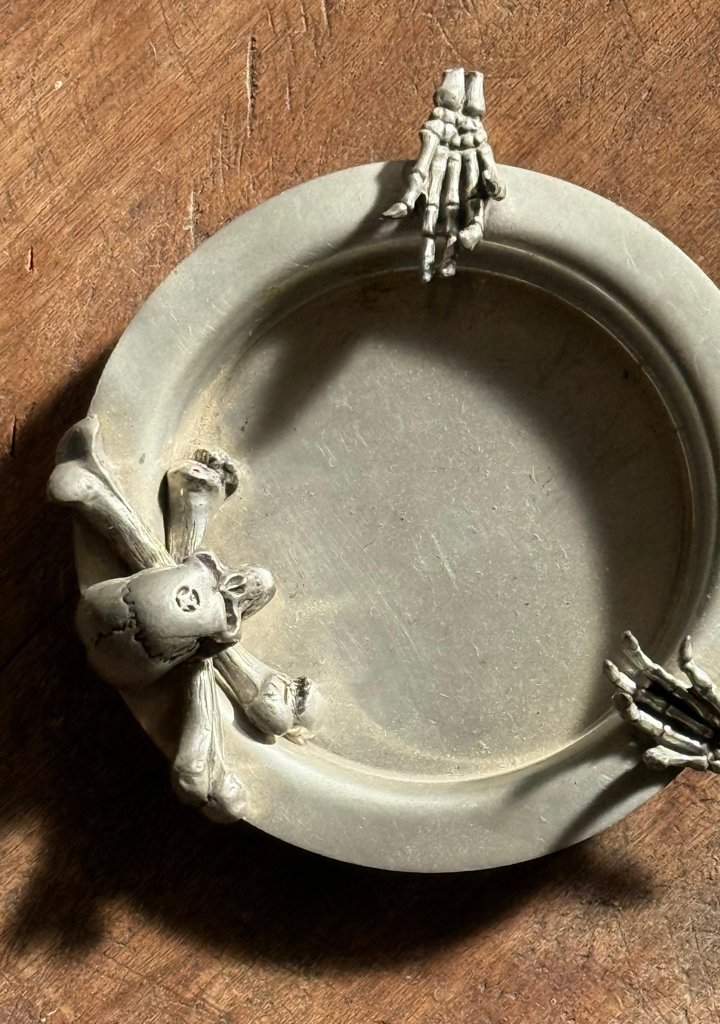 Hand-Crafted A pewter ashtray ft. skeleton skull and crossbones by Alchemy, 20th century For Sale