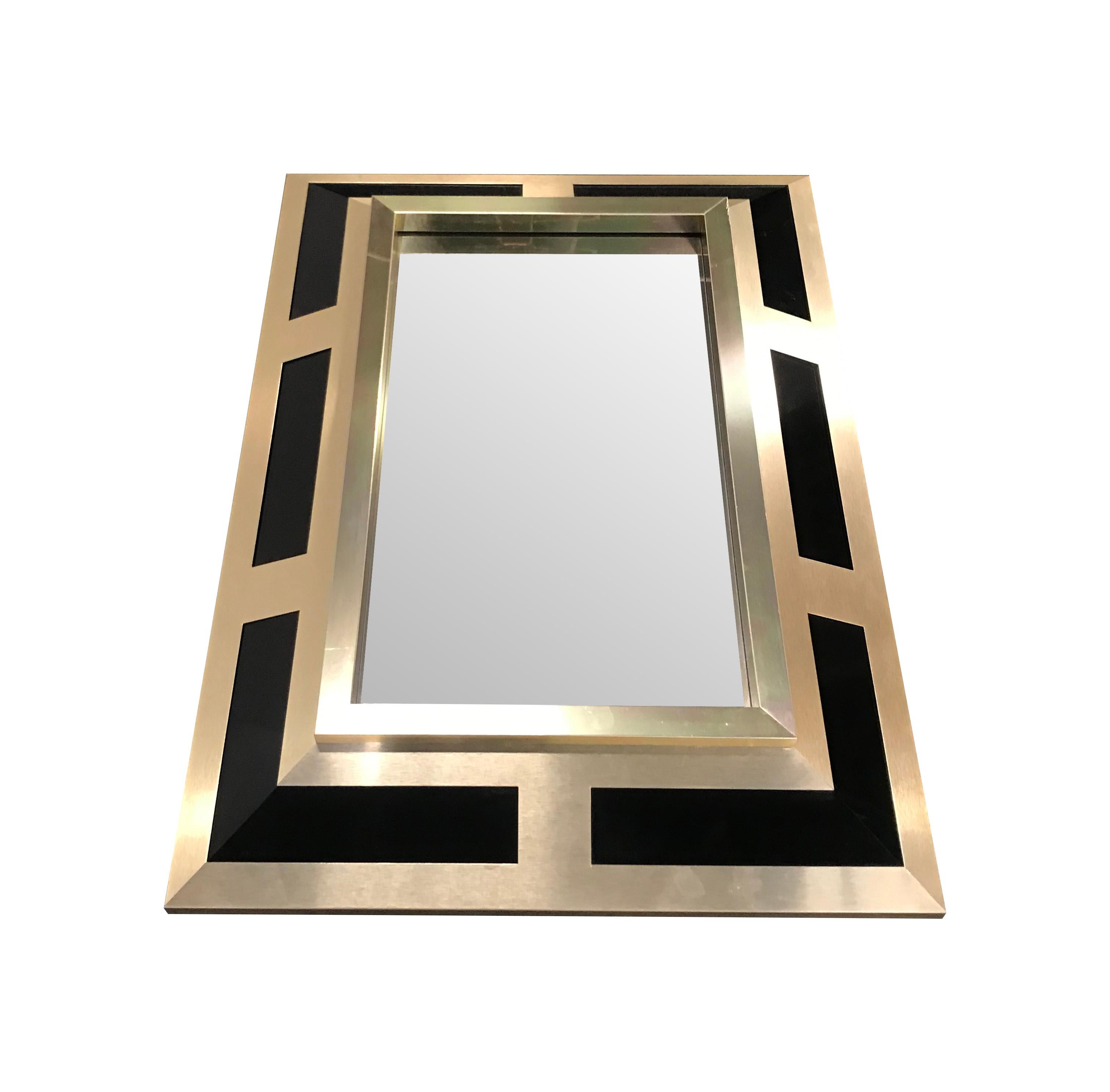 A rare Philippe Jean brushed brass finish and black Lucite mirror signed 