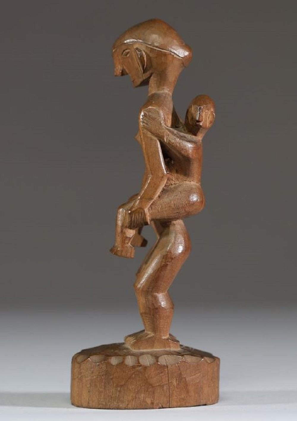 Tribal A Philippine Carved Wooden Maternity Figure From The Ifugao Tribe, Early 20th C For Sale