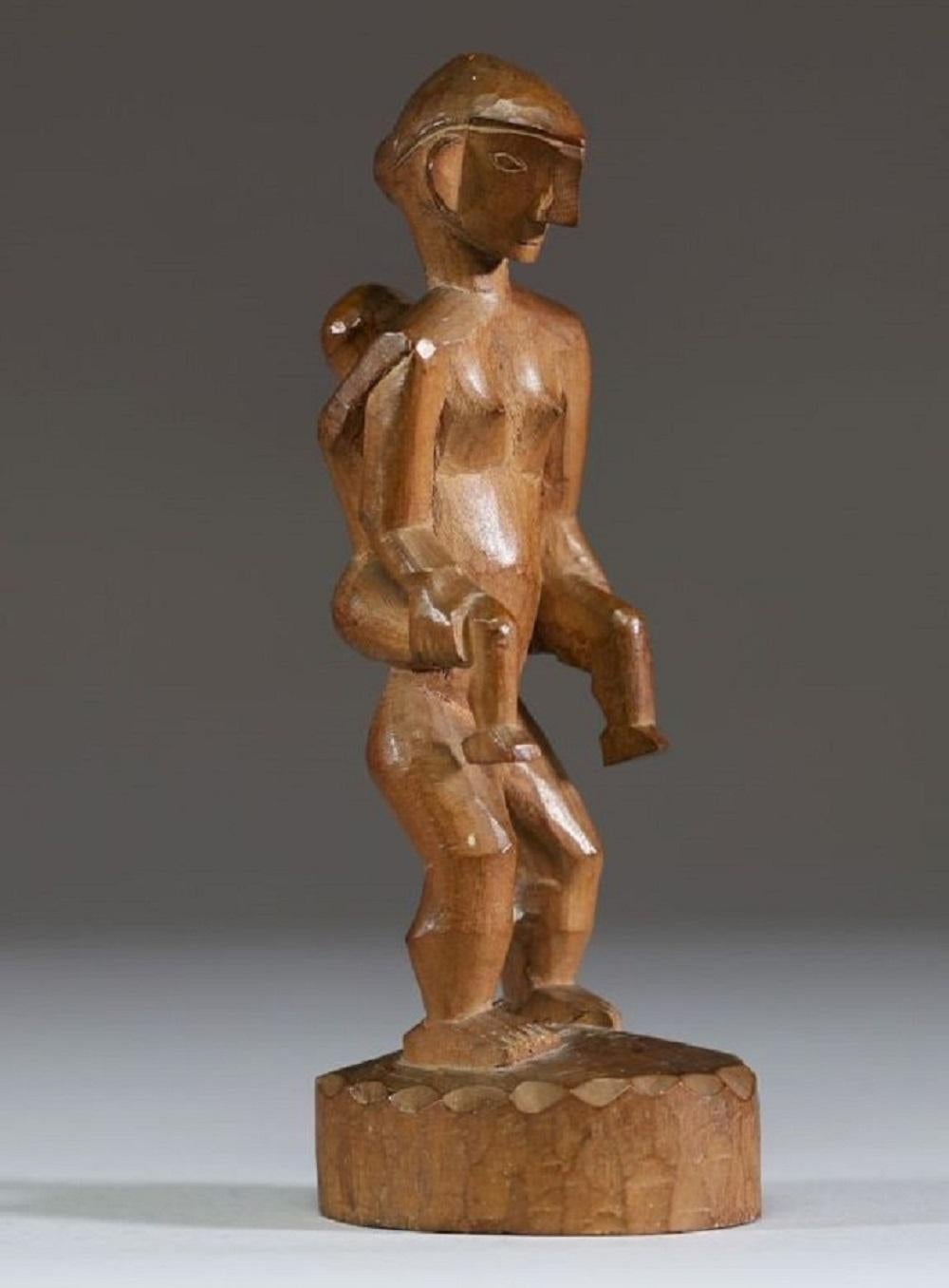 Hand-Carved A Philippine Carved Wooden Maternity Figure From The Ifugao Tribe, Early 20th C For Sale