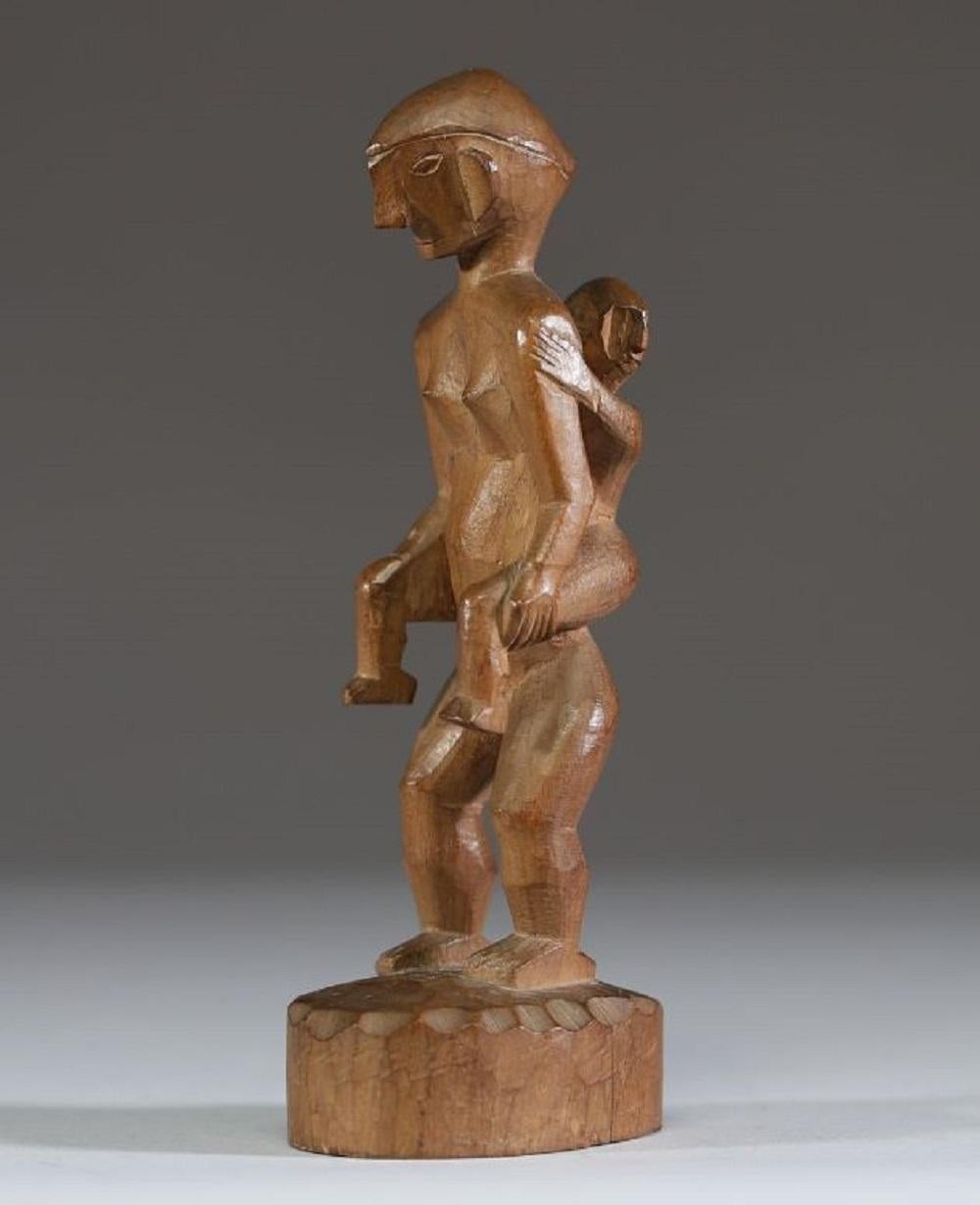 A Philippine Carved Wooden Maternity Figure From The Ifugao Tribe, Early 20th C In Good Condition For Sale In Bilzen, BE