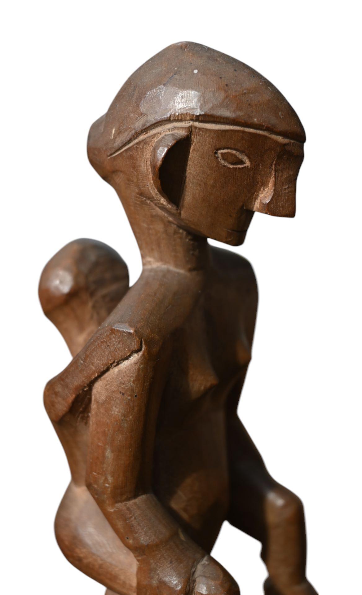 20th Century A Philippine Carved Wooden Maternity Figure From The Ifugao Tribe, Early 20th C For Sale