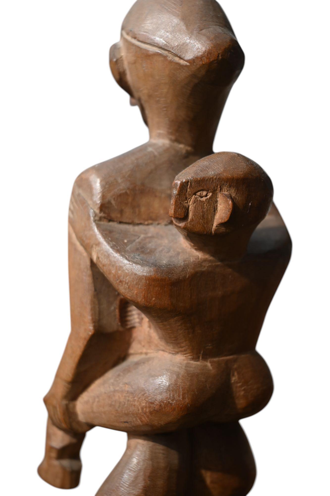 A Philippine Carved Wooden Maternity Figure From The Ifugao Tribe, Early 20th C For Sale 1