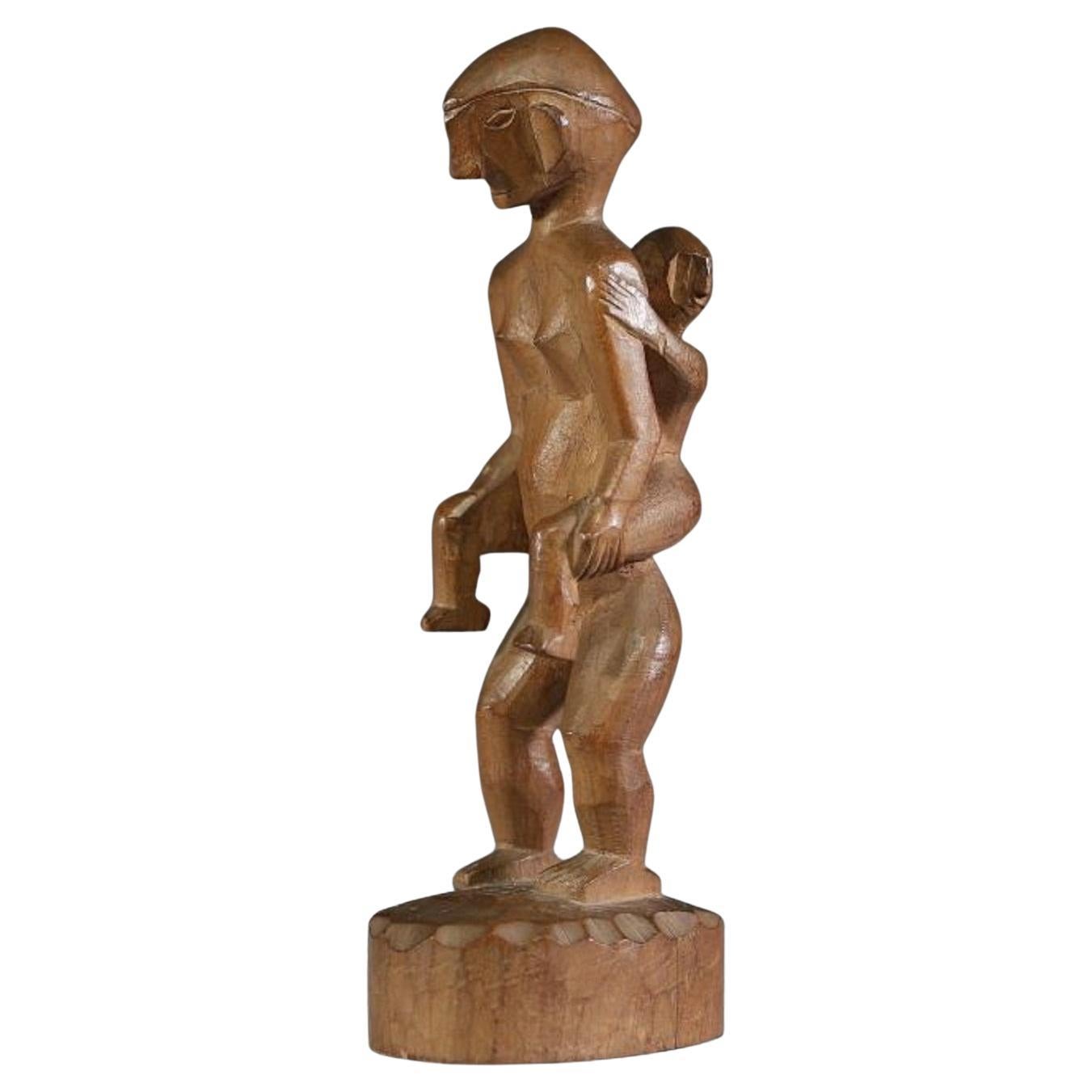 Figura de maternidad filipina tallada en madera de la tribu ifugao, principios del siglo XX