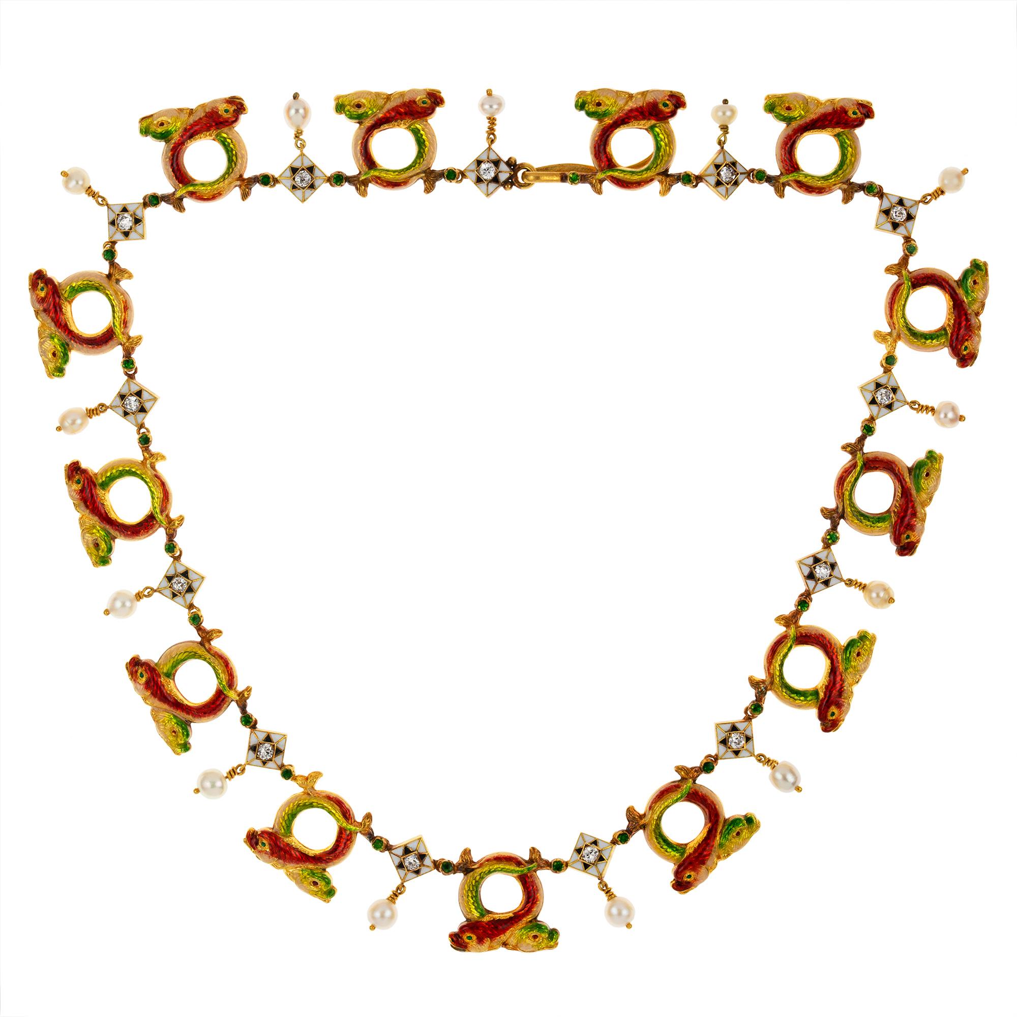 A Phillips enamelled fish necklace, the thirteen openwork links depicting two coiled fish the one enamelled in red and the other in green colours, connected with thirteen lozenge shaped links, each centrally set with an old-cut diamond surrounded by