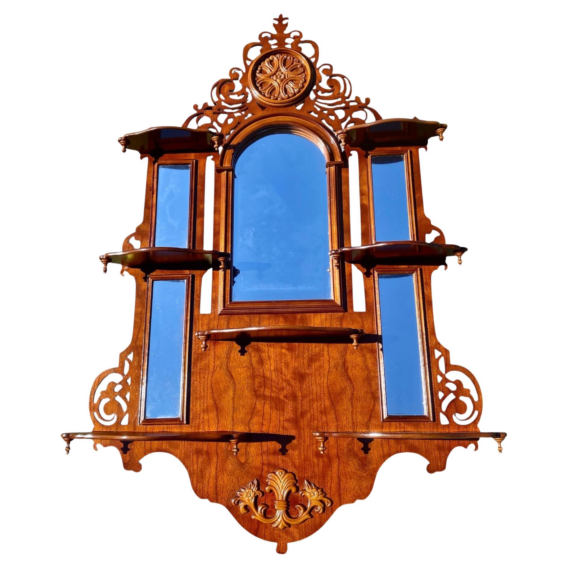 A Pierced Carved Wood Multi Shelf Wall Shelf With Central Arched Mirror For Sale