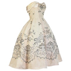 A Pierre Balmain Couture Ballgown numbered 87681 in Cream Silk Circa 1955/1957