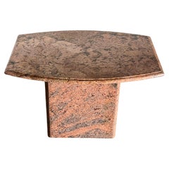 A pink granite side table, late 20th century 