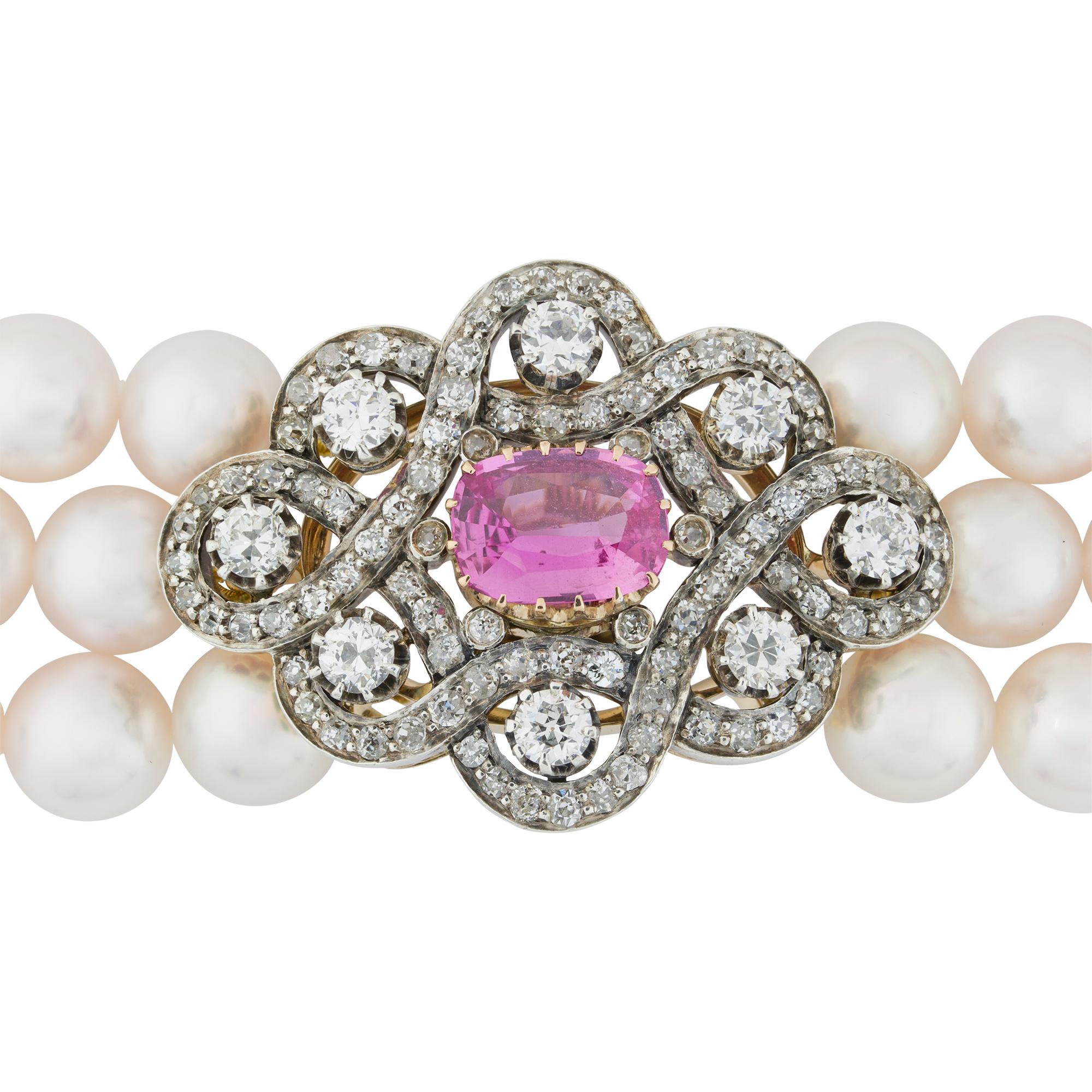 A pink sapphire, diamond and cultured pearl necklace, the detachable Victorian centrepiece, horizontally-set with an oval faceted pink sapphire weighing 2.62 carats, to a lozenge shape frame consisted of eight old brilliant-cut diamonds each within