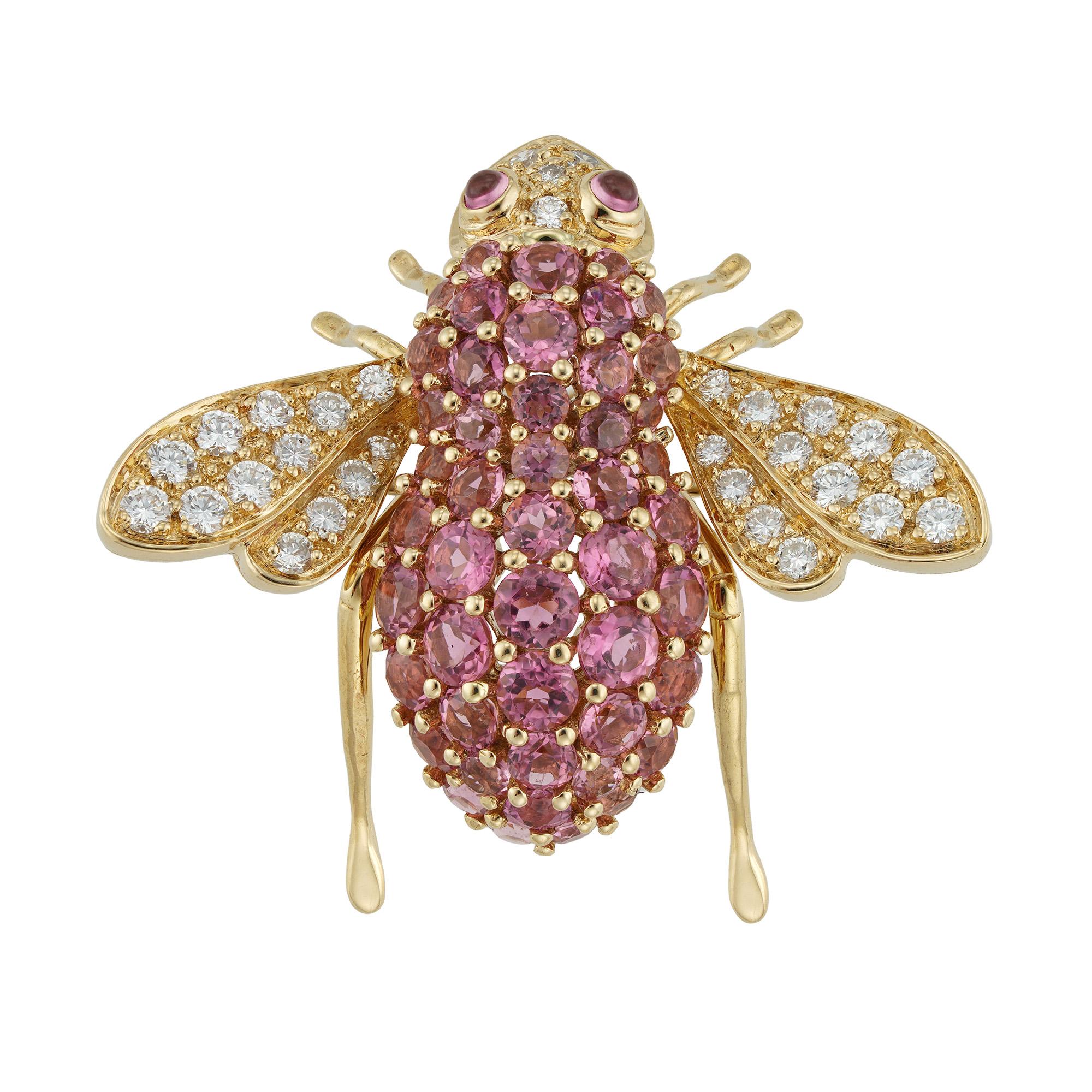 A pink tourmaline and diamond bee brooch, the wings and the head set with thirty-one round brilliant-cut diamonds estimated to weigh 0.9 carats in total, the thorax, the abdomen and the eyes set with forty-nine round faceted pink tourmalines of