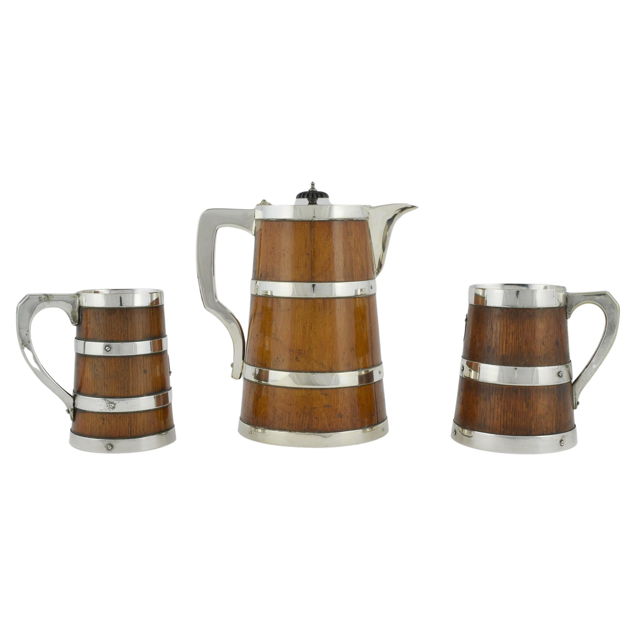 A Pitcher and two tankards For Sale