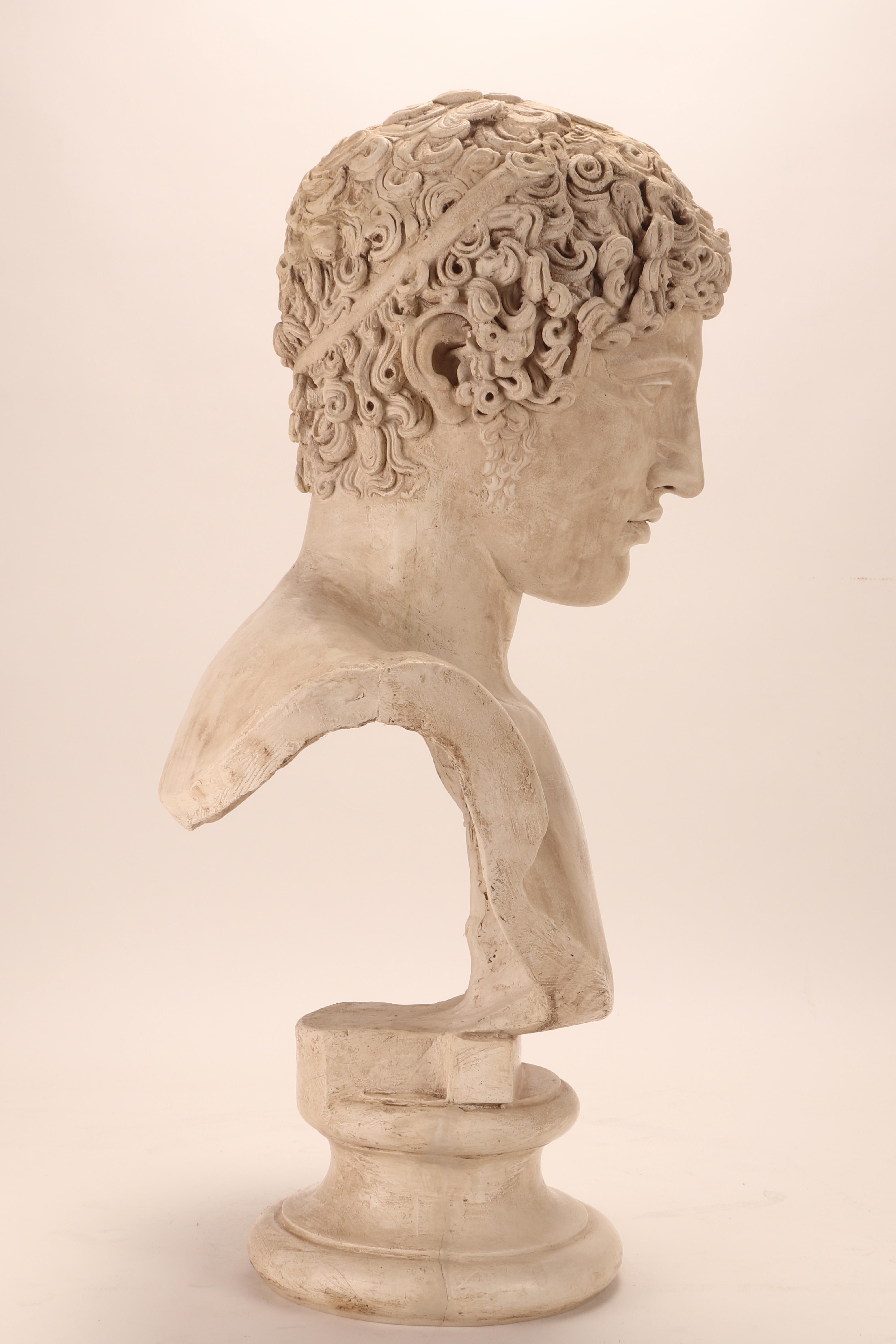 A plaster cast: the bust of Hermes, Italy 1890. Over the plaster base is set the plaster cast of the bust of Hermes. Cast for drawing teaching in Academy. Italy circa 1890. 