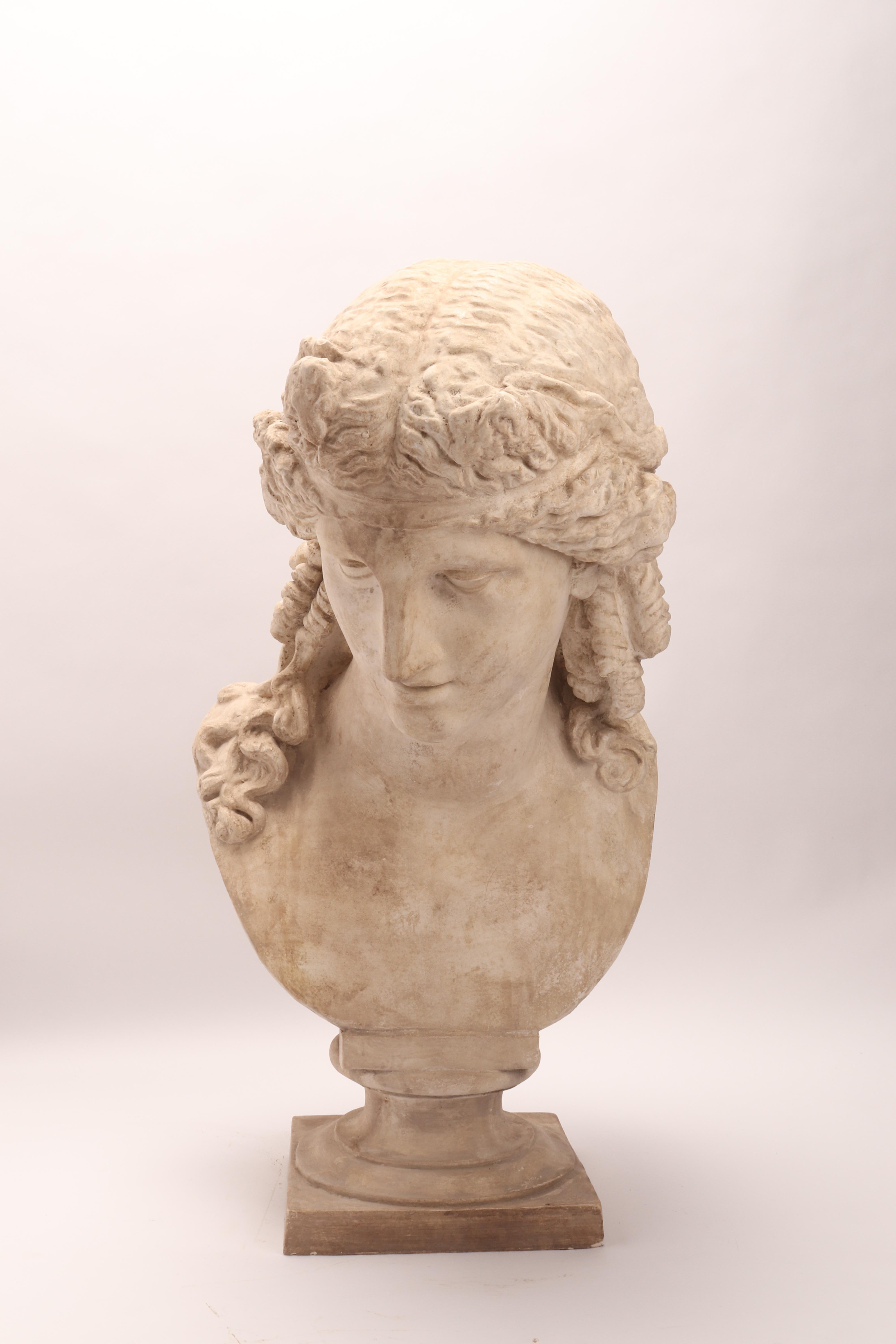 Over the plaster base is set the plaster cast of the head of Arianna, Rome I century A.C.-III century D.C. Cast for drawing teaching in academy, Italy, circa 1890.