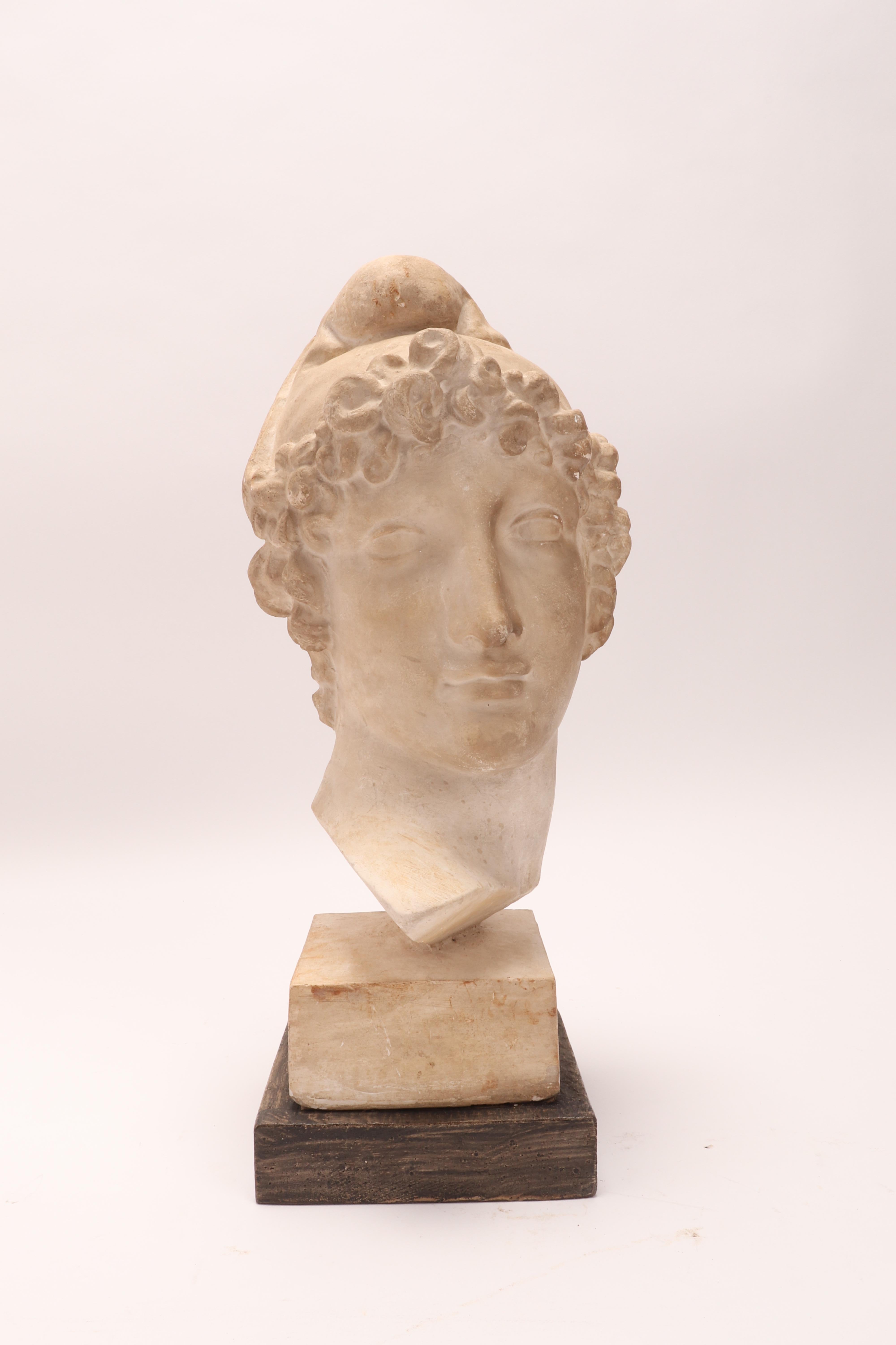 Over the wooden black painted base is set the plaster cast of the head of Paride, da Antonio Canova. The cast for drawing teaching in Academy, Italy, circa 1890.