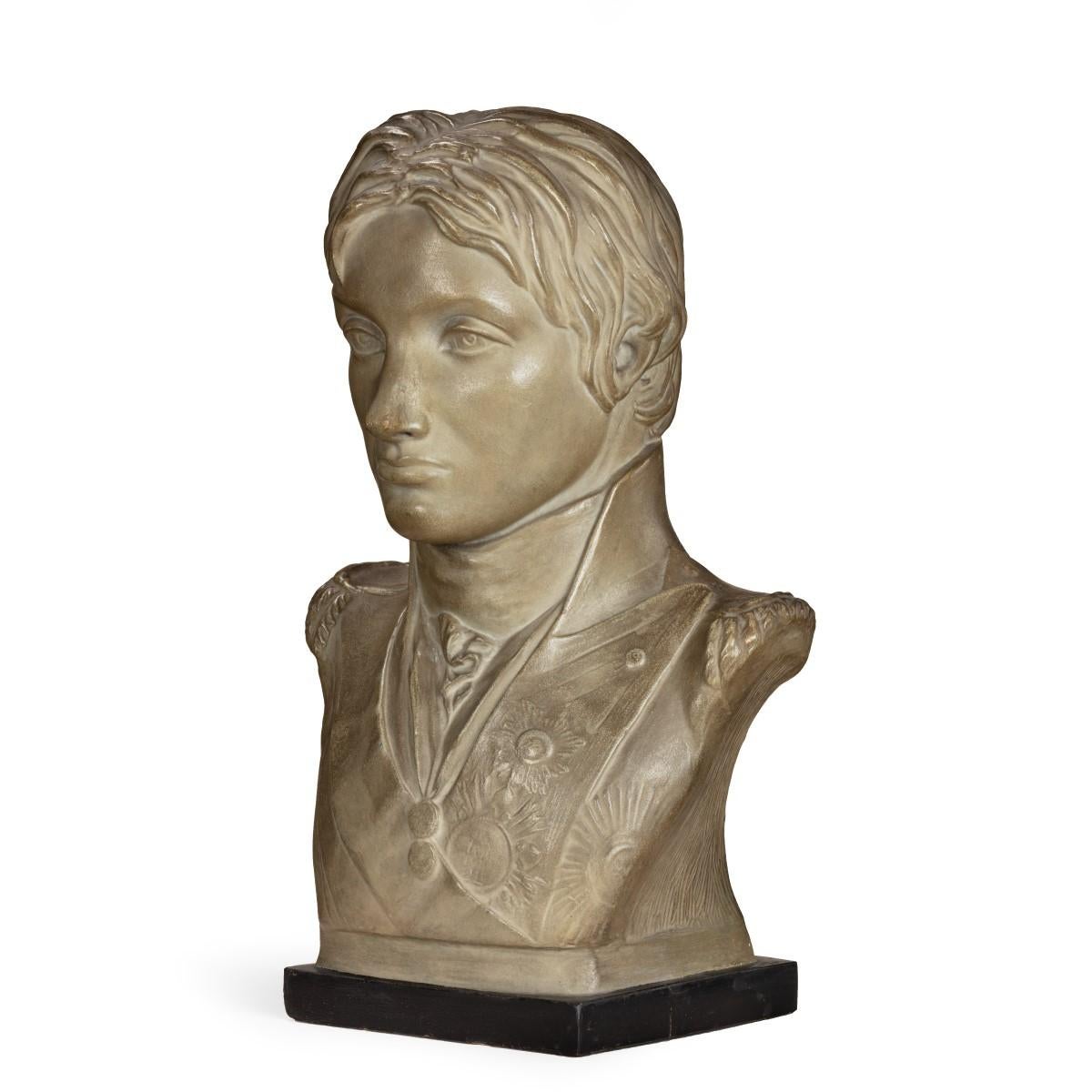 This bust of Admiral Lord Nelson was probably produced by Bartholomew Papera after the 1798 marble bust by Anne Seymour Damer. The reverse is impressed, ‘Anna S. Damer Fecit’ and ‘Pub. As the Act Dir’. Incomplete paper label on the integral black