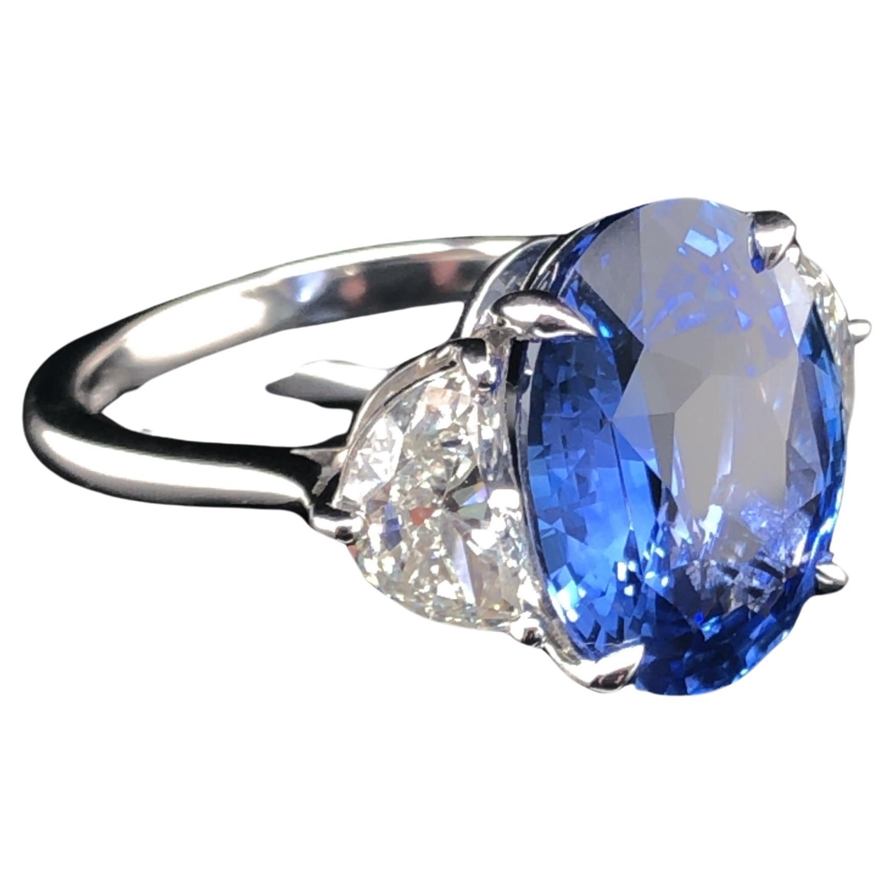 A Platinum 7.56 CTS Ceylon Sapphire and Half Moon Diamond Ring 