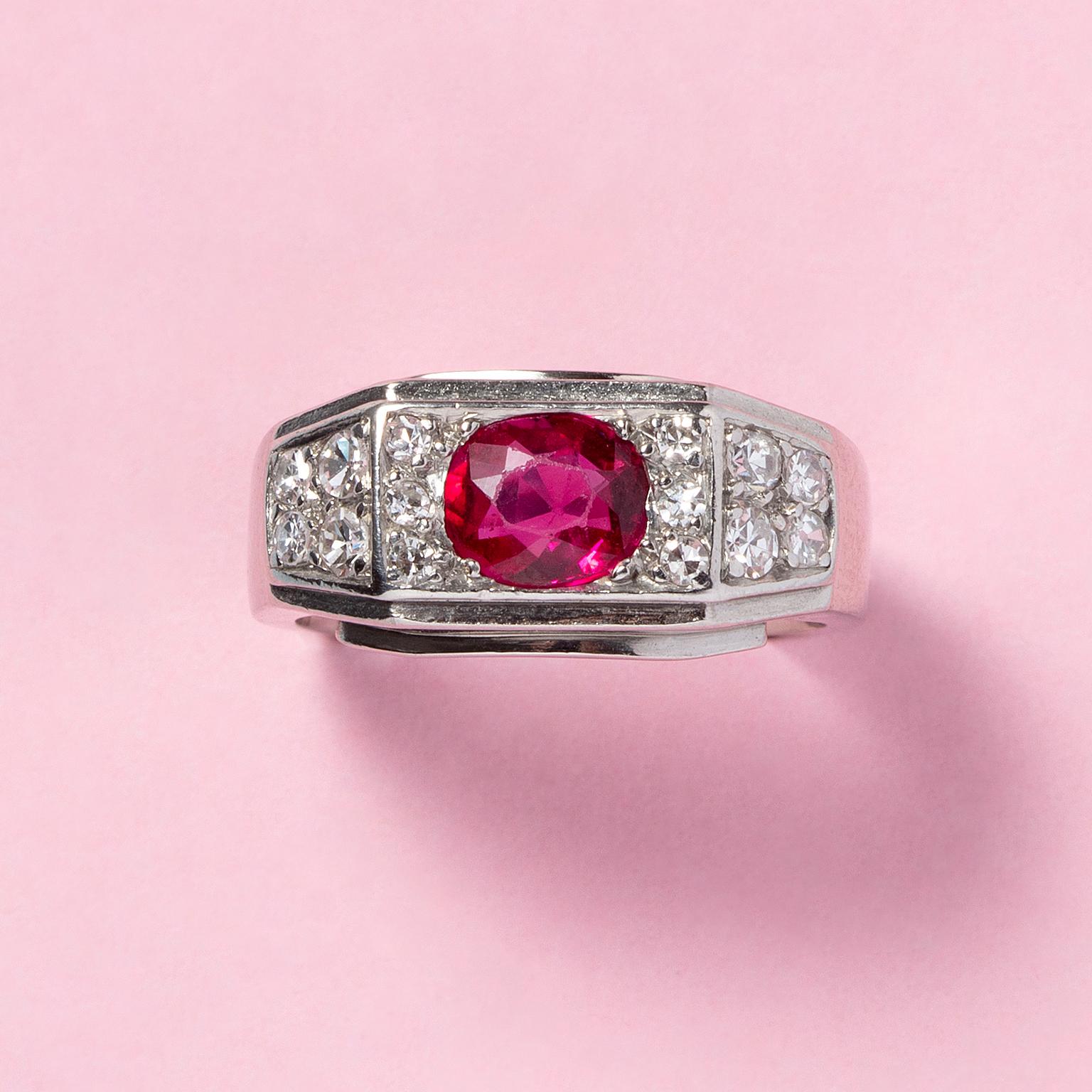 A platinum ring set with an oval untreated Burma ruby (app. 0.8 carat) and old cut diamonds, France, circa 1920.

weight: 7.9 g
size: 16.5 mm / 6 US
width: 3 - 8.5 mm