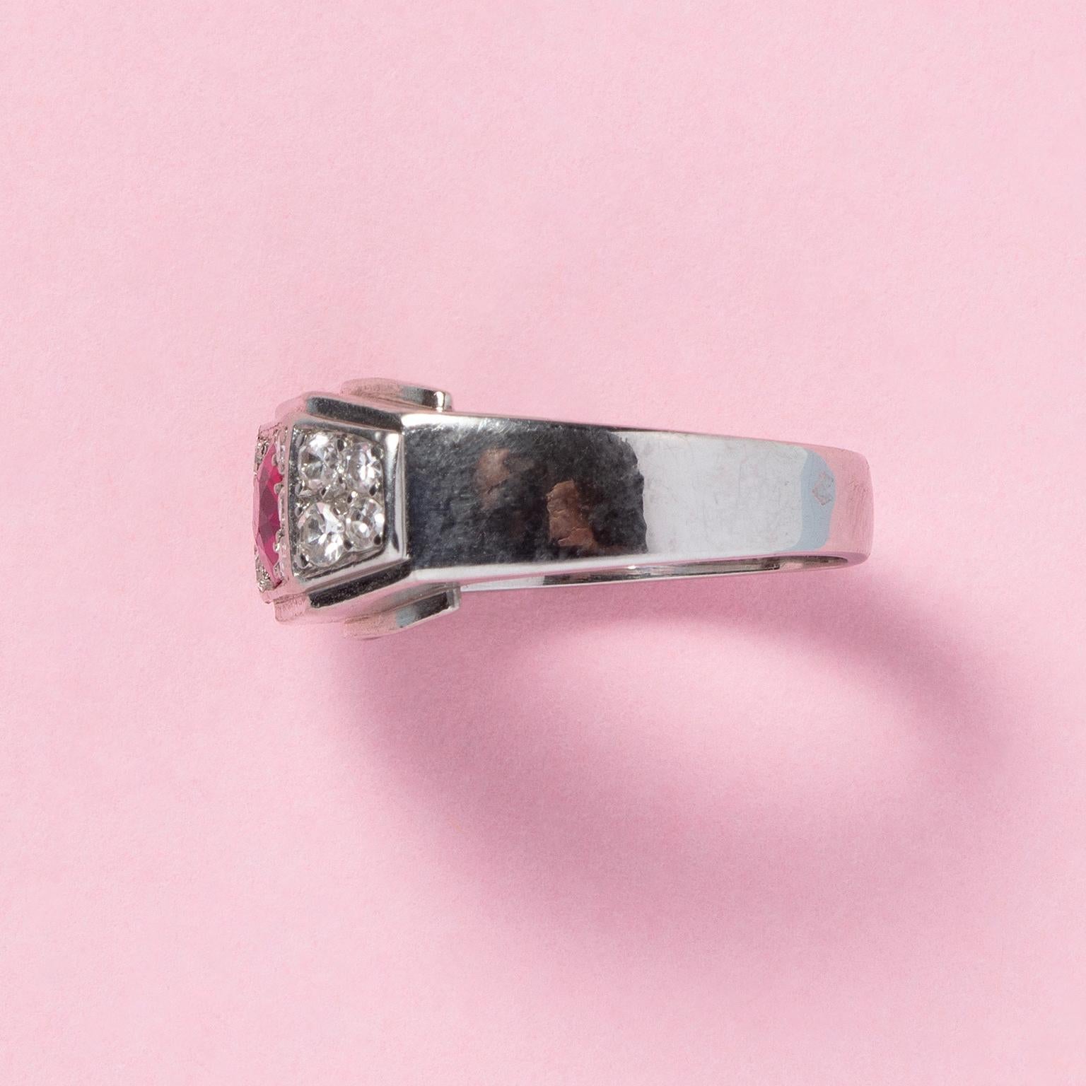 Oval Cut A Platinum Art Deco Ring Set with Diamonds and An Oval Facetted Burma Ruby For Sale